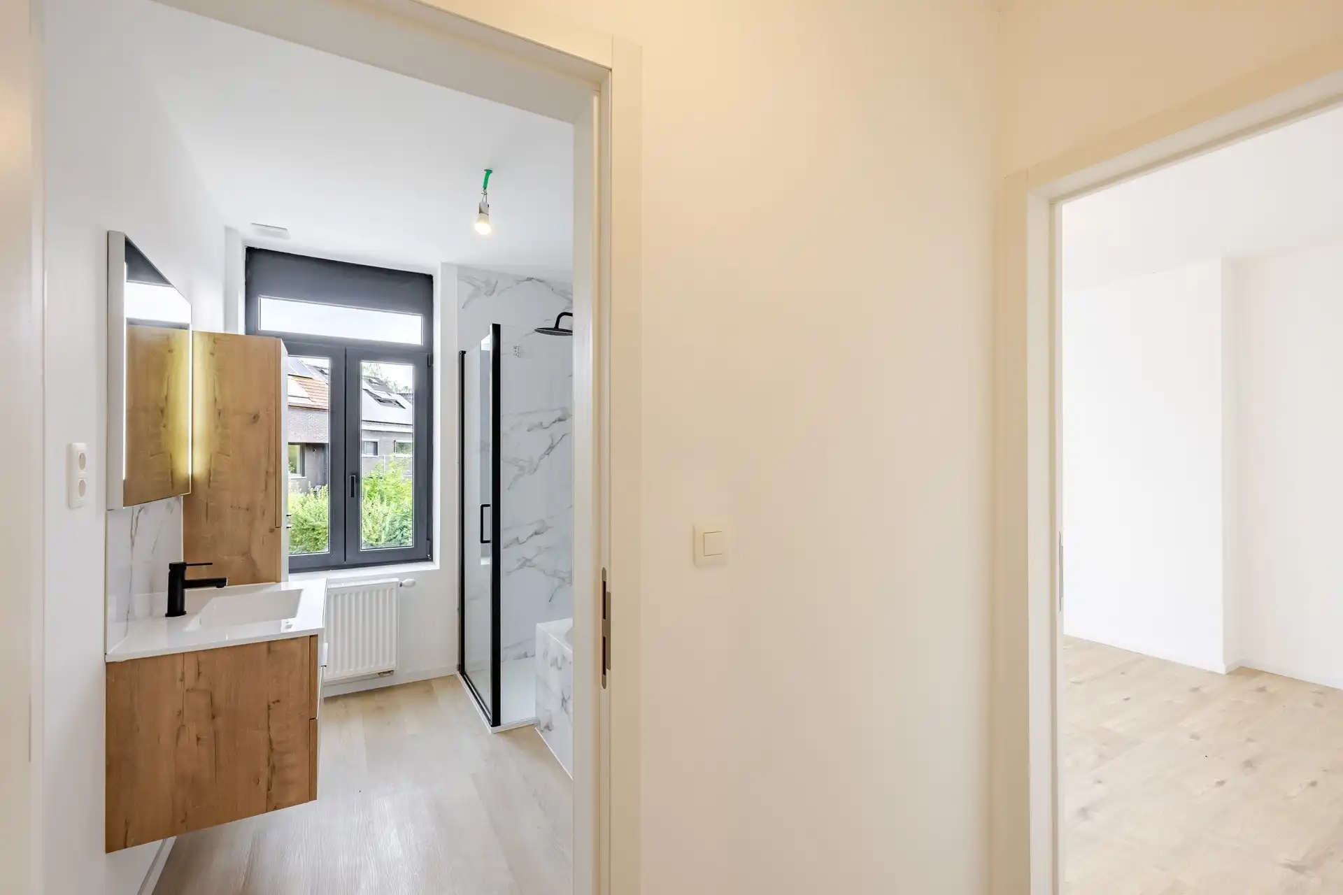 Instapklare, volledig gerenoveerde gezinswoning met 4 slaapkamers, garage en zonnige stadstuin foto 18