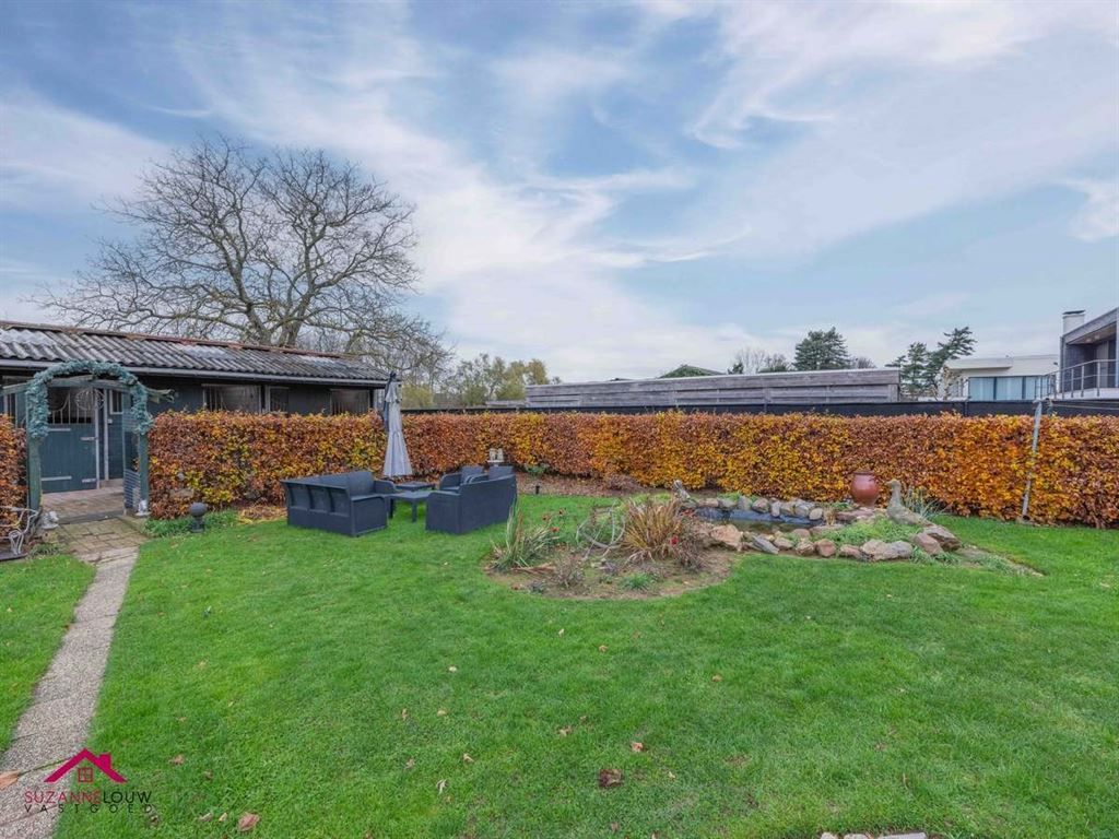 Verrassend ruime en gezellige, instapklare vrijstaande woning met paardenstal foto 8