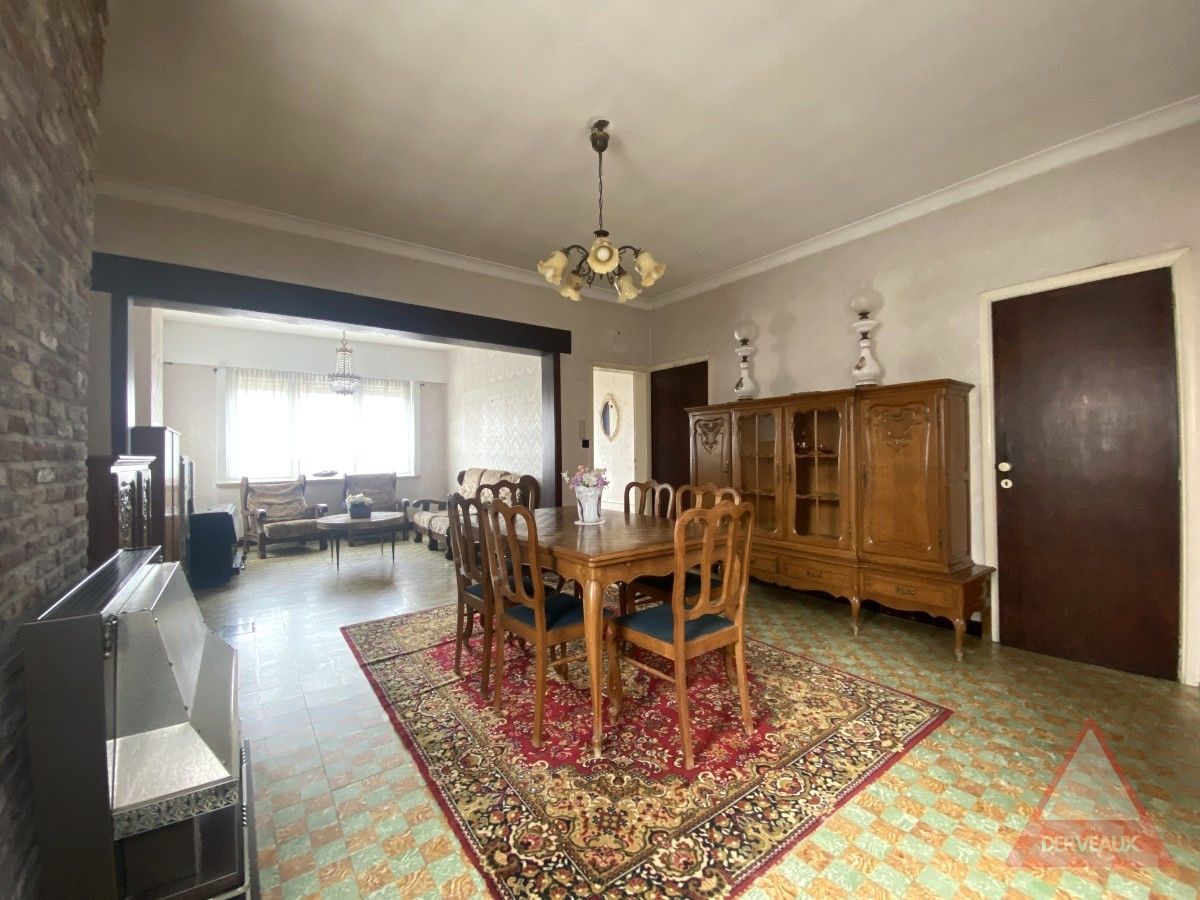 Passendale – Te renoveren woning met tuin, garage en vaste trap naar zolder foto 4