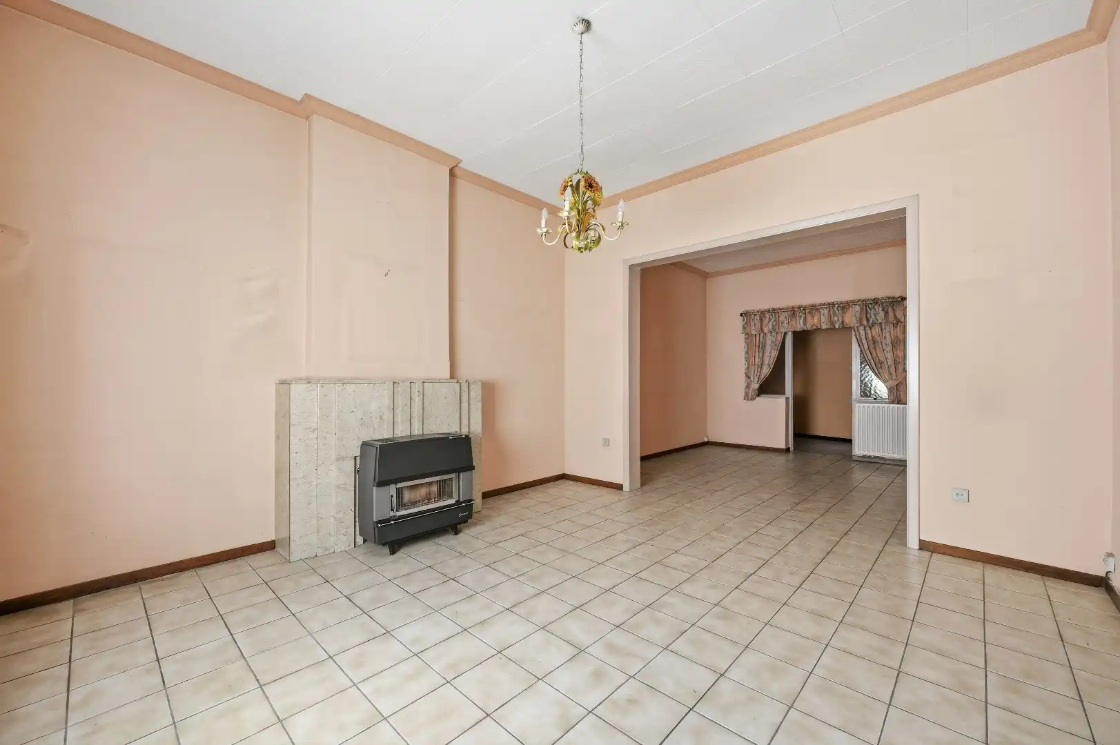 Te renoveren rijwoning in Attenhoven met tuin, garage en 3 slaapkamers foto 6