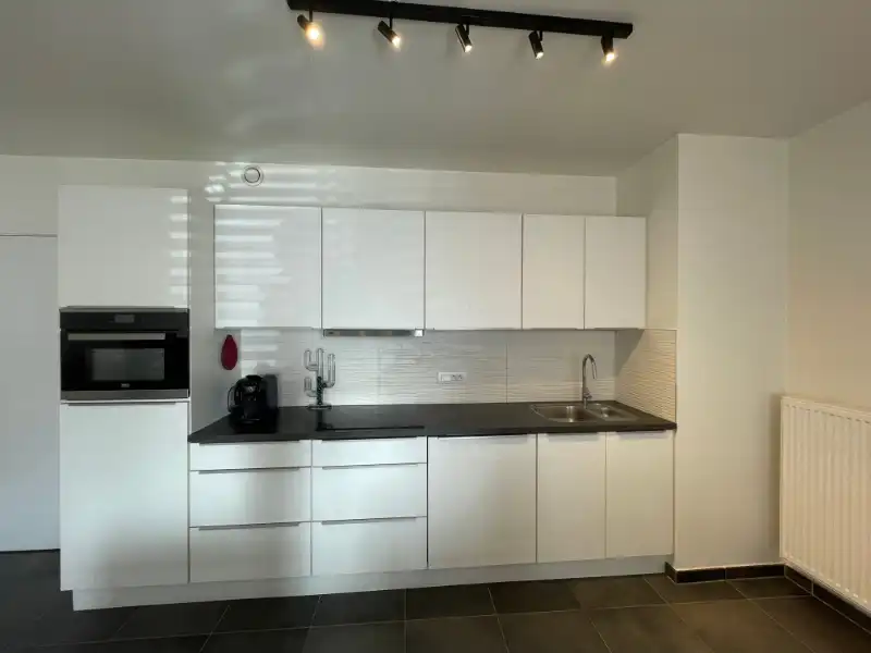 CENTRAAL GELEGEN GELIJKVLOERS APPARTEMENT MET GARAGE IN OOSTDUINKERKE-BAD! foto 7