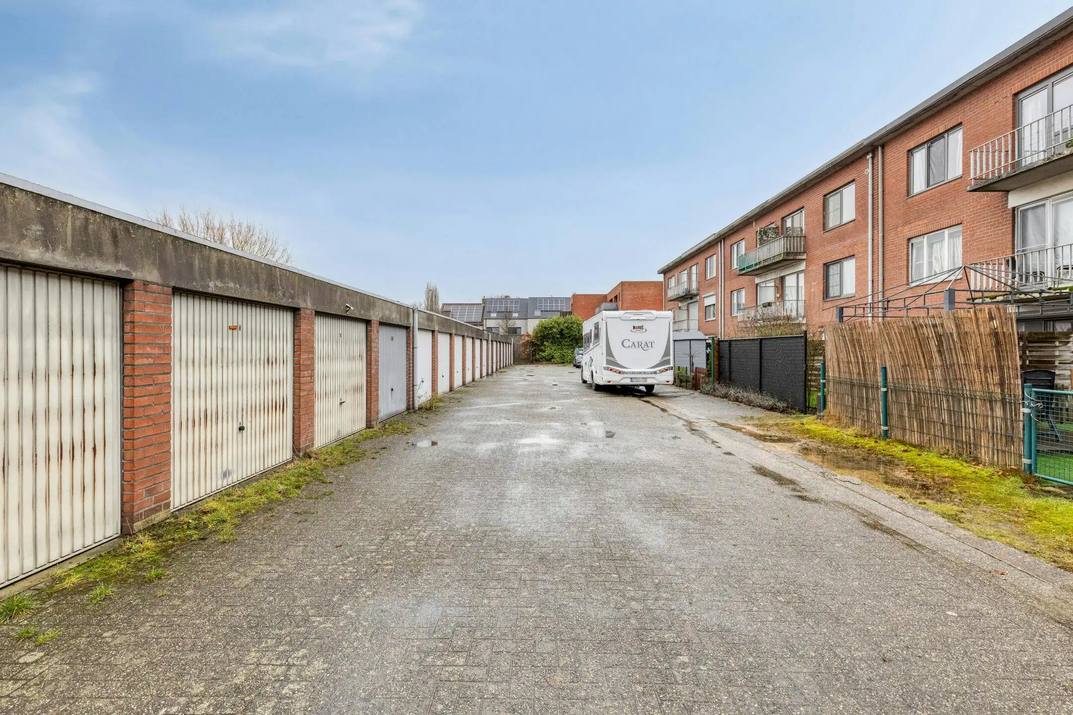 Gelijkvloers appartement met ZW-tuin en garage te koop foto 14