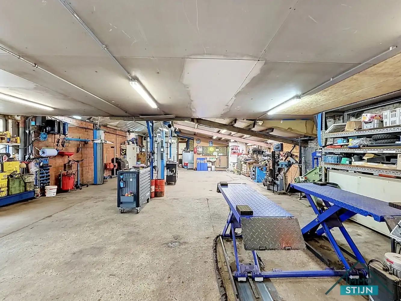 Instapklare woning met werkplaats foto 19