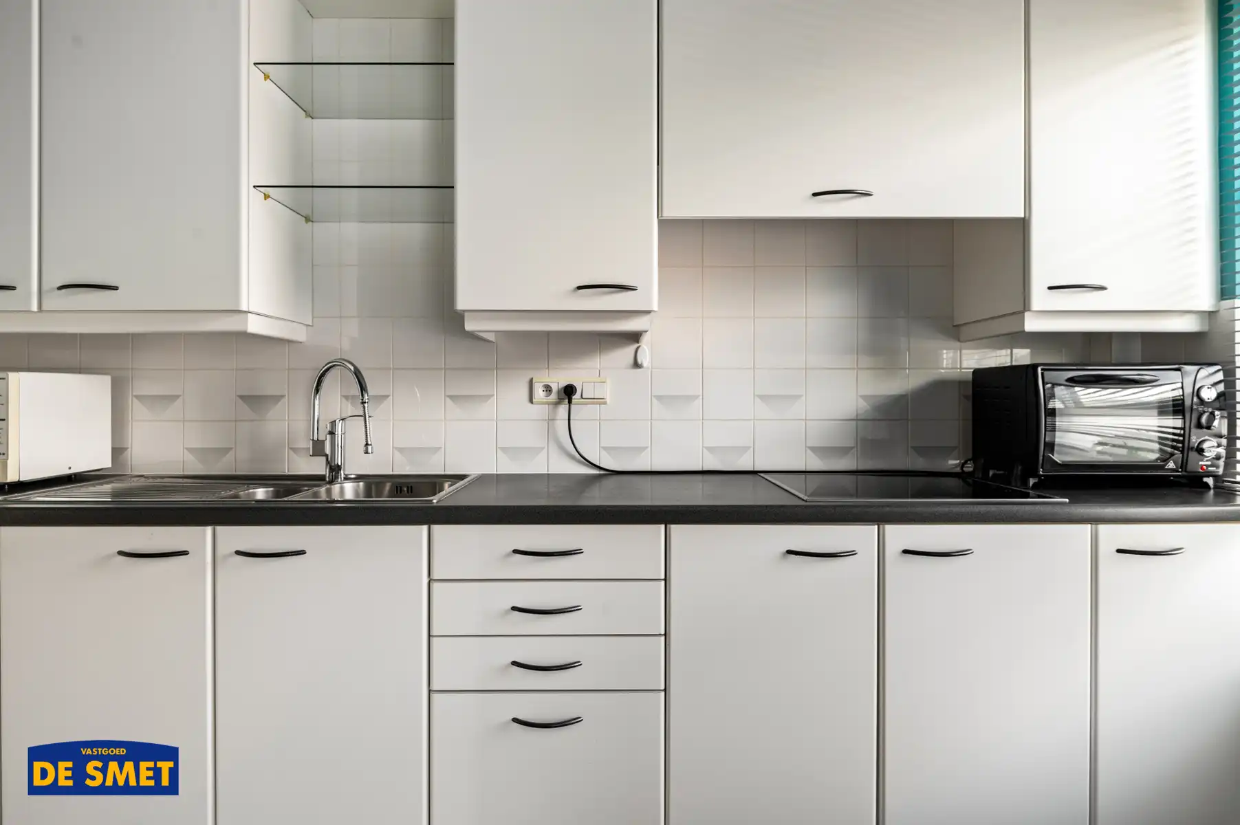 Zéér goed onderhouden appartement met balkon én terras foto 8