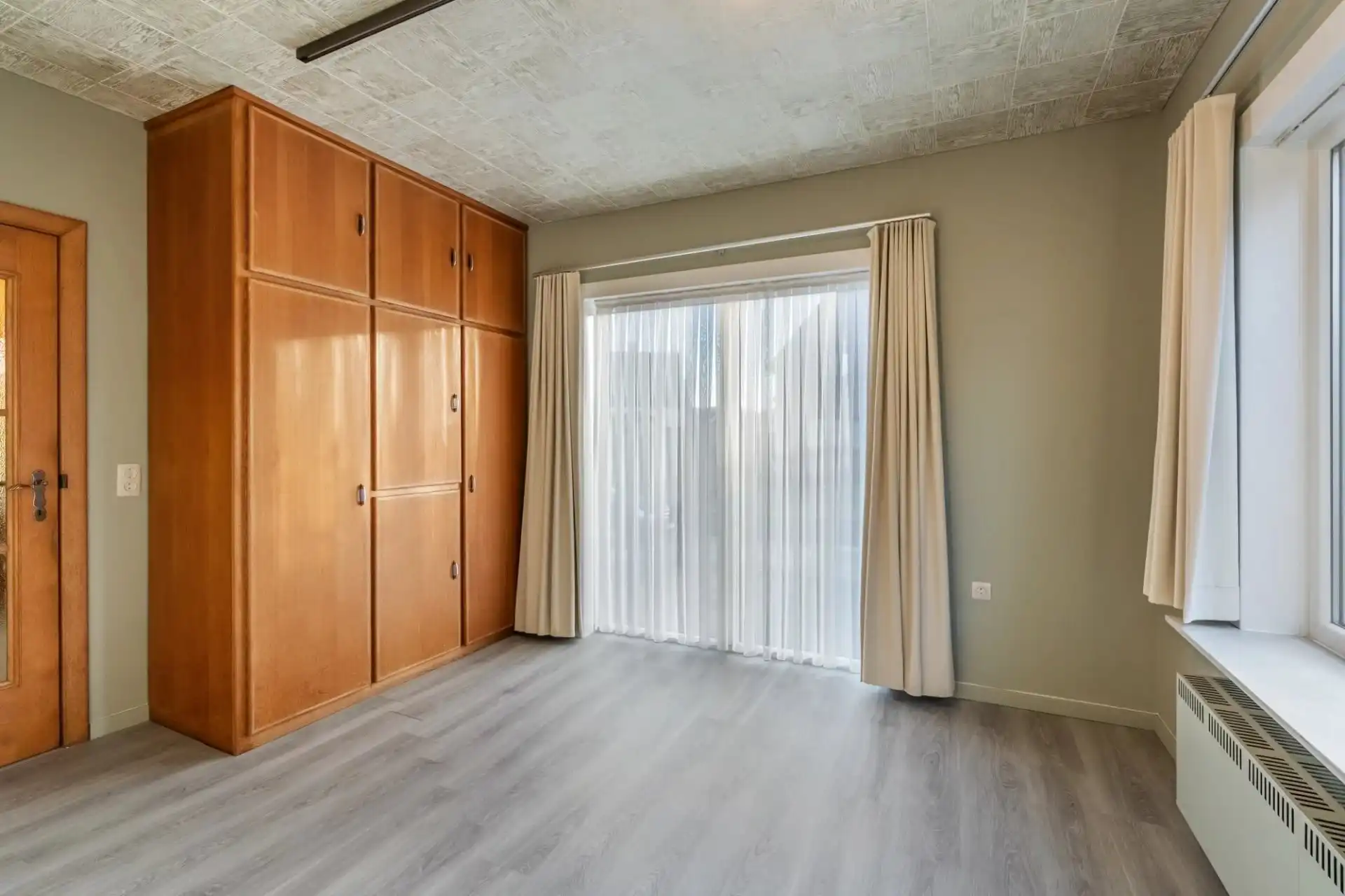 Ruime woning in rustige straat te Koersel foto 7