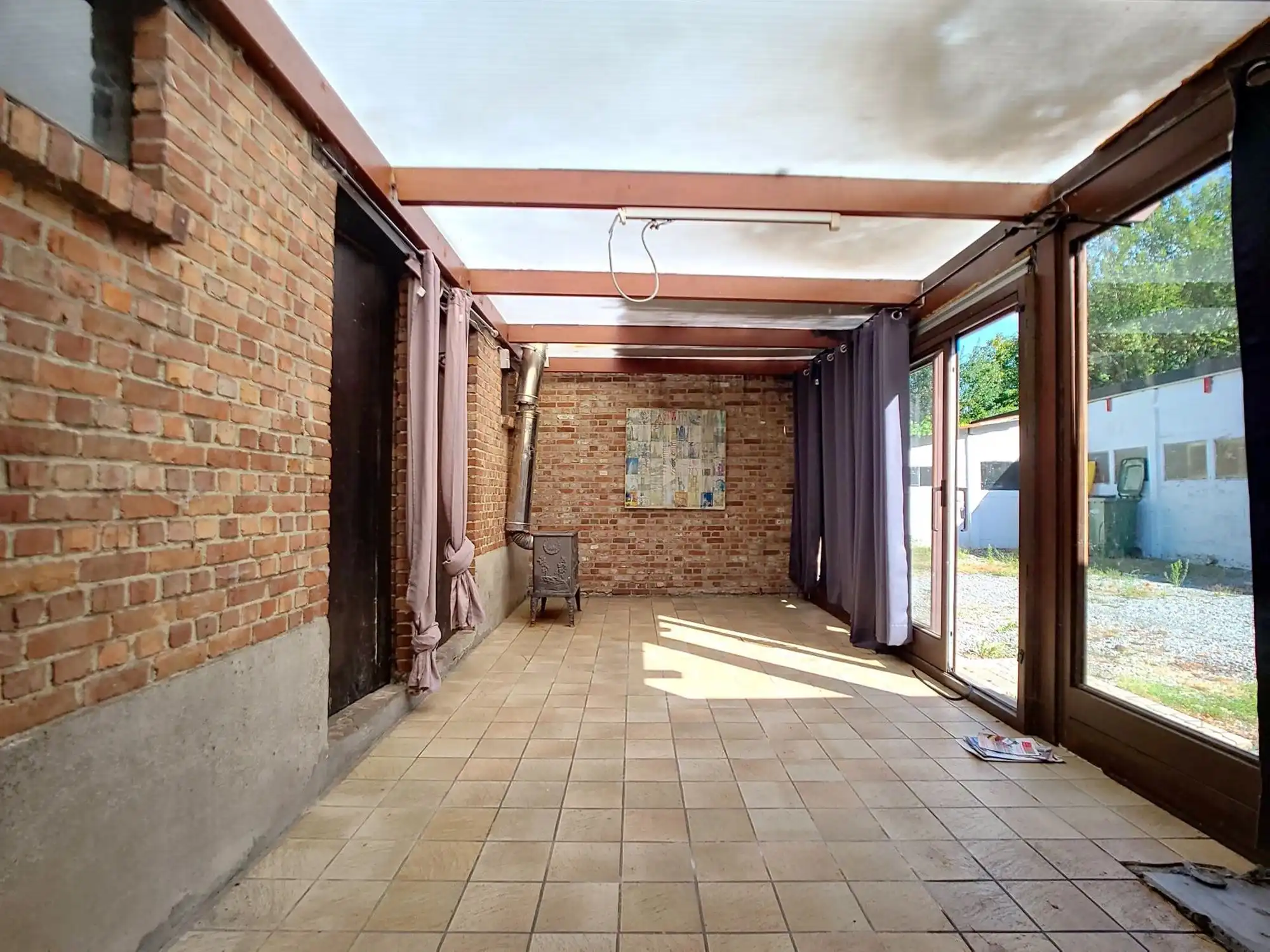Te renoveren halfopen bebouwing met garage en ruime tuin foto 9
