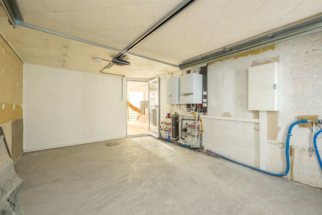 Gerenoveerde woning met zuidgerichte tuin foto 27