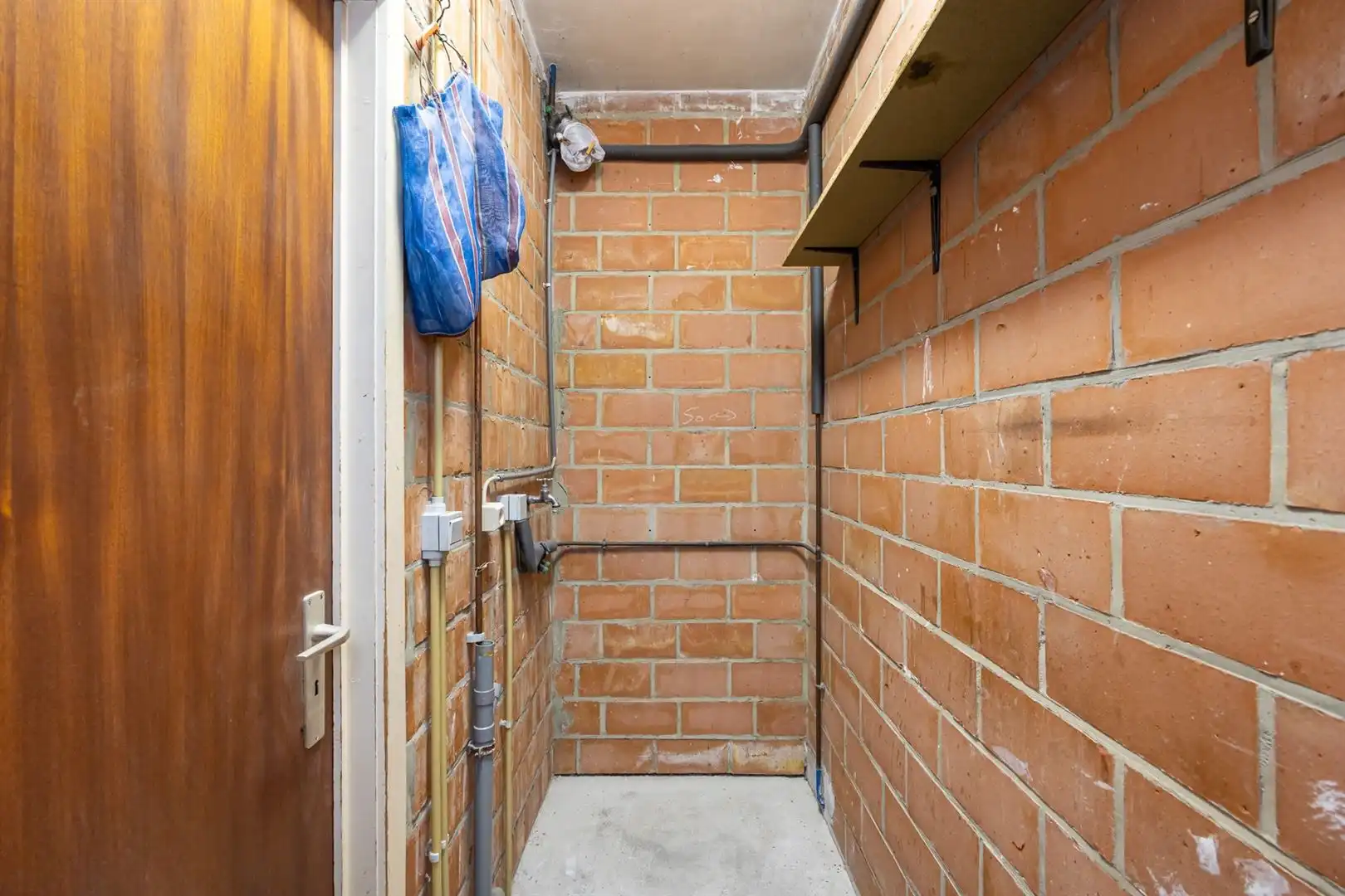 Te renoveren gezinswoning met tuin en garage in rustige centrumstraat foto 23