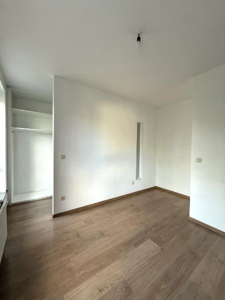 Rustig gelegen woning met mooie tuin en carport foto 10