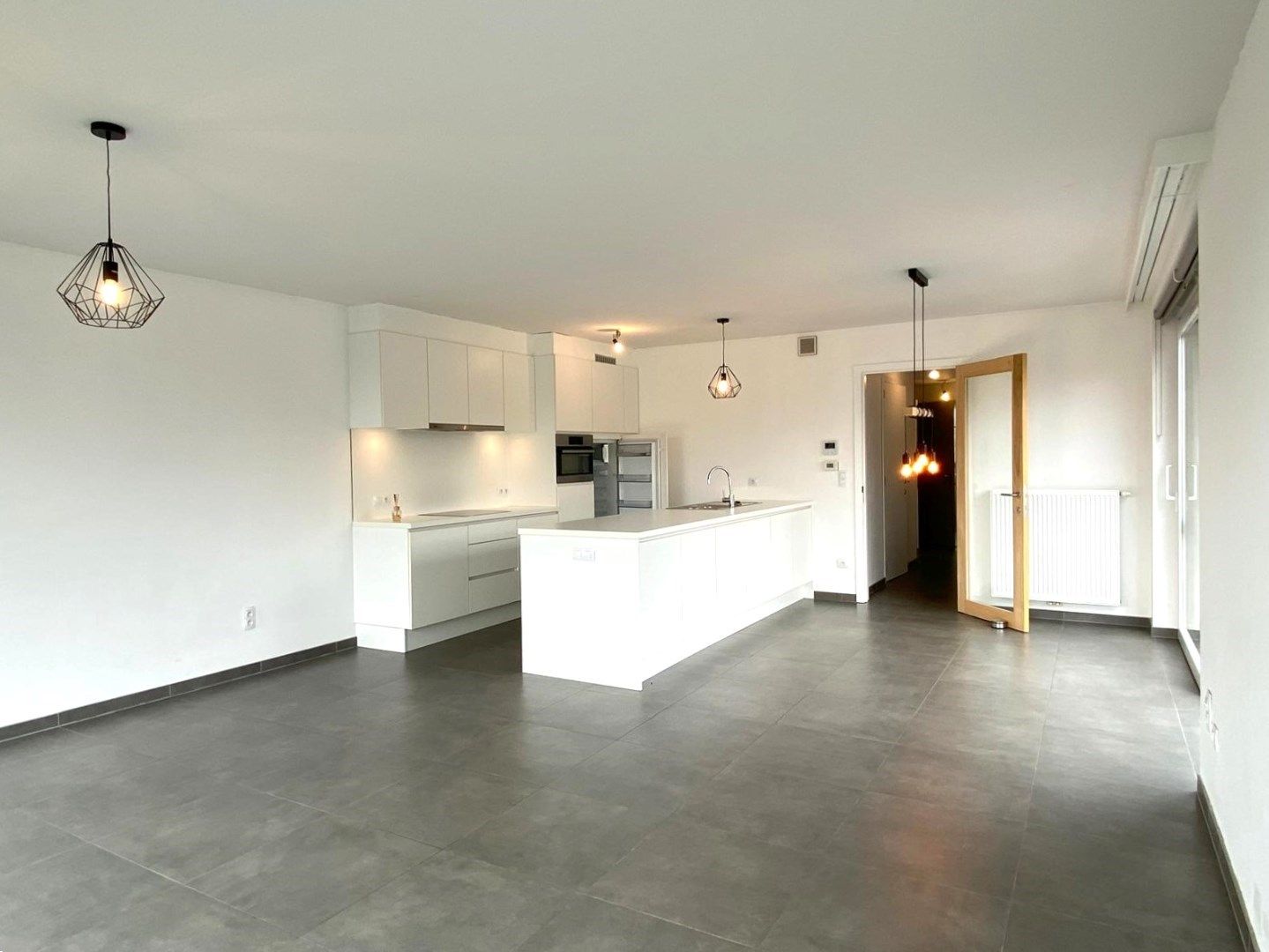 INSTAPKLAAR EN ENERGIEZUINIG APPARTEMENT MET 2 SLPKS | 2 TERRASSEN EN GARAGEBOX foto 3