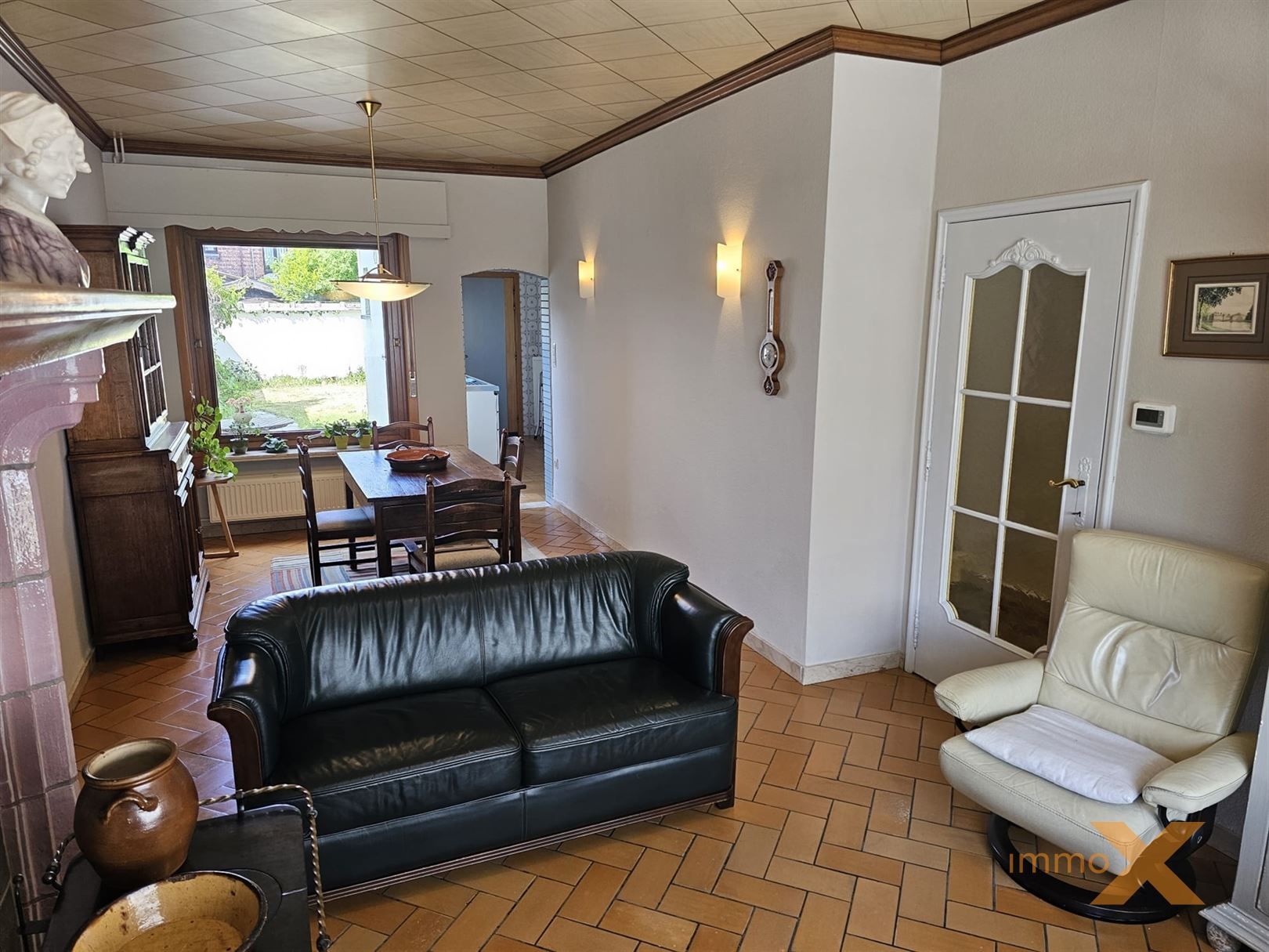 CHARMANTE WONING MET TUIN EN GARAGE foto 9