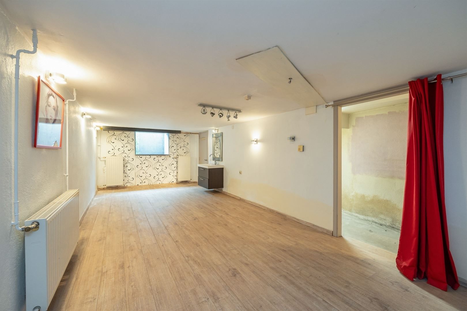 Handelshuis met ruime winkel en duplex appartement in dorp 's Gravenwezel foto 13