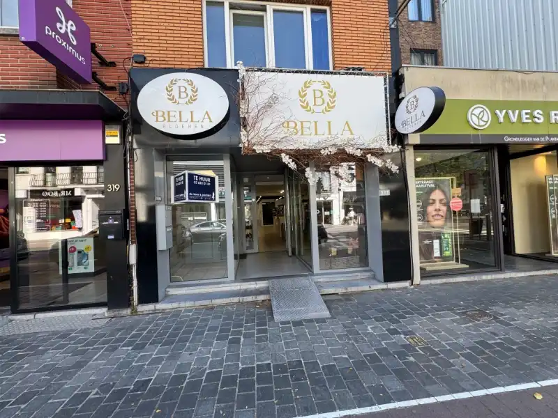 OPBRENGSTEIGENDOM, Handelspand met duplex appartement foto 2