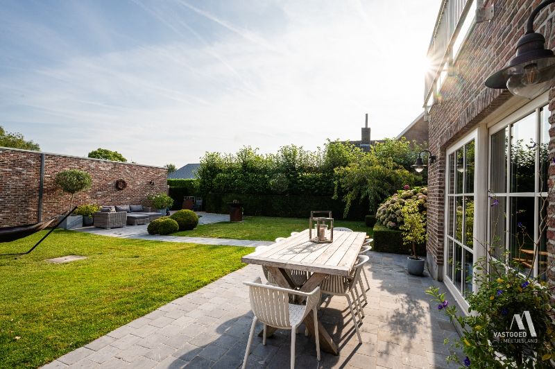 Gelijkvloers villa - appartement met privatieve tuin foto 17