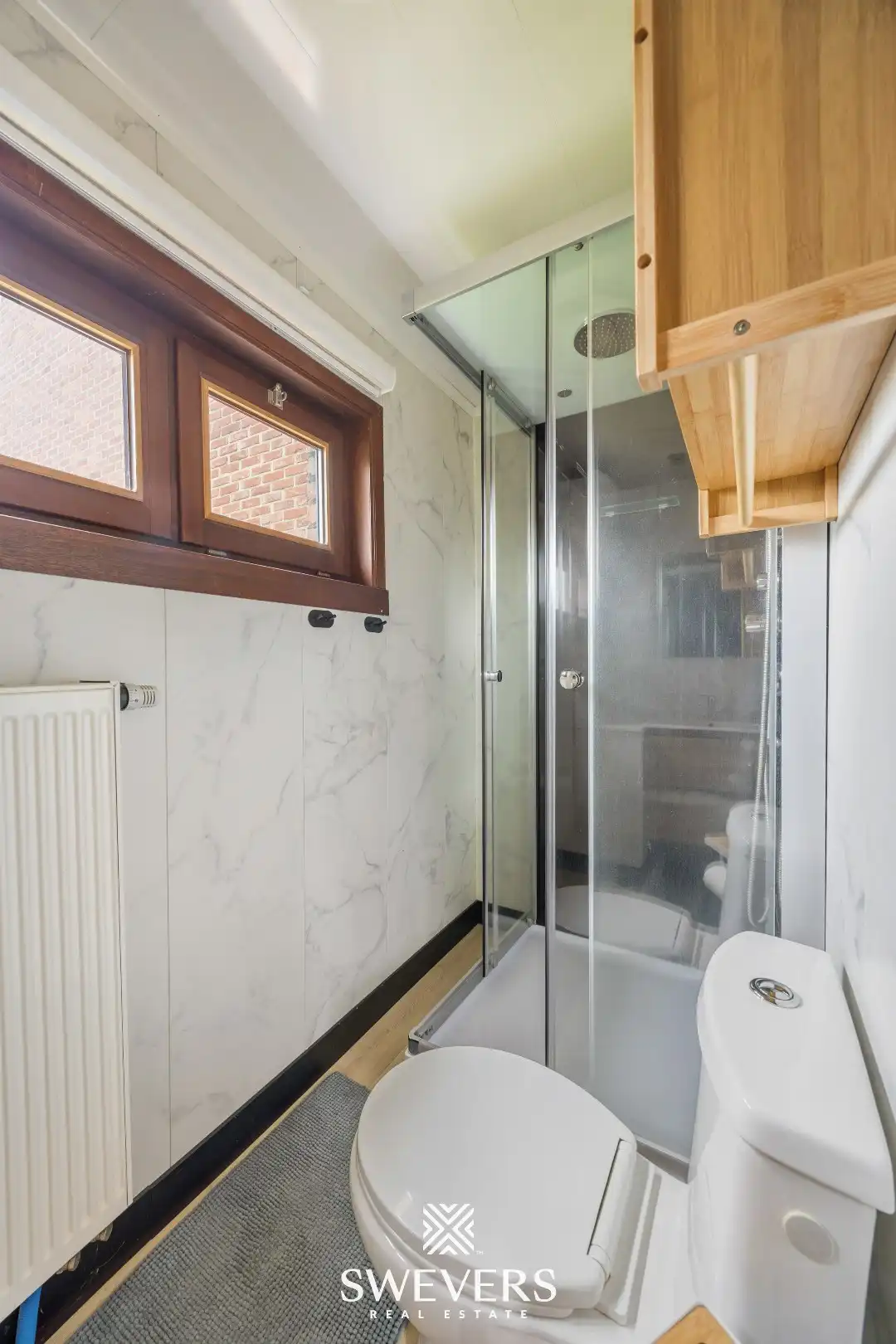 Gerenoveerde starterswoning met 2 slaapkamers en aangename tuin in Leopoldsburg foto 11
