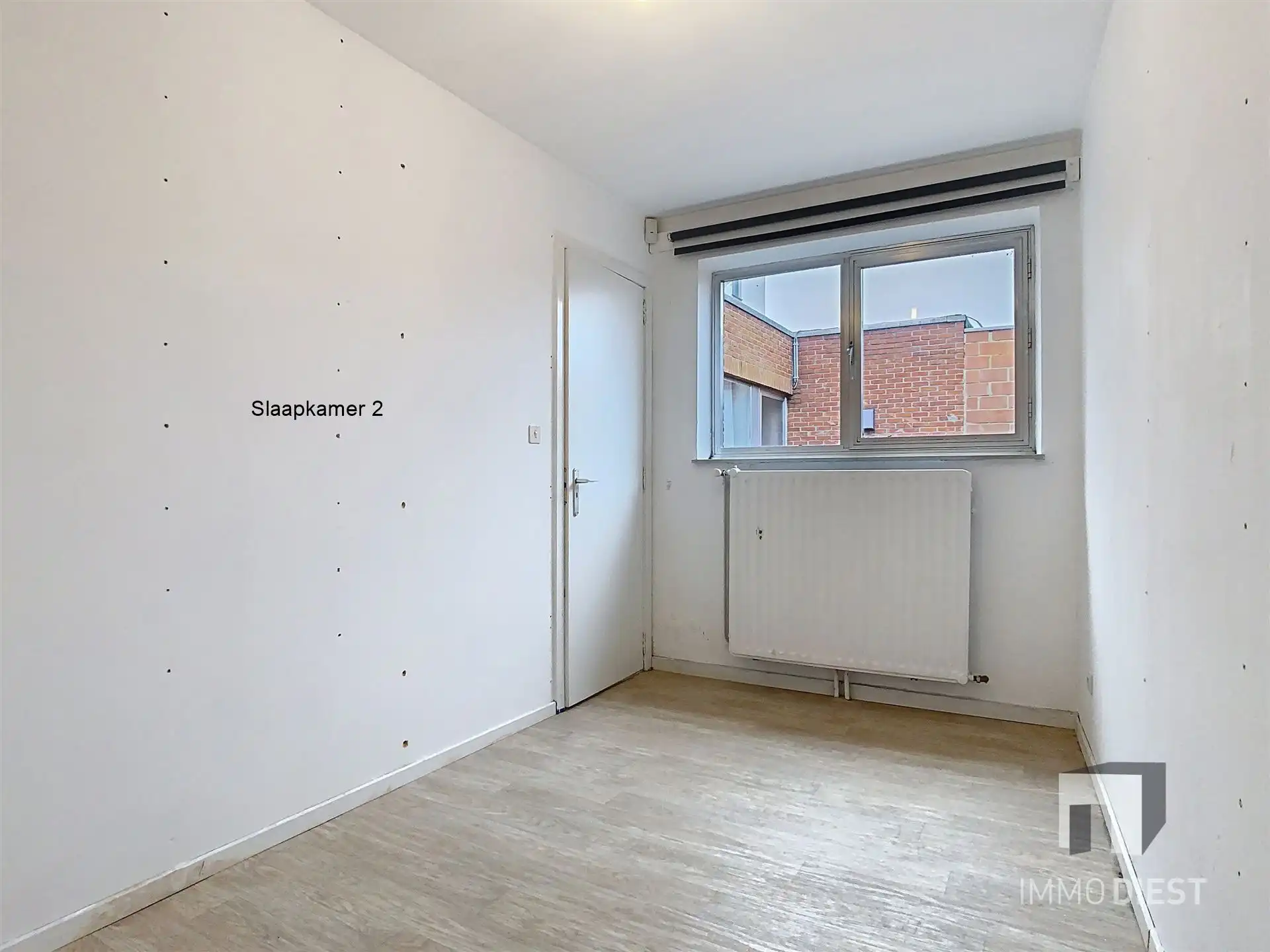 Handelsgelijkvloers met achterliggend appartement foto 19