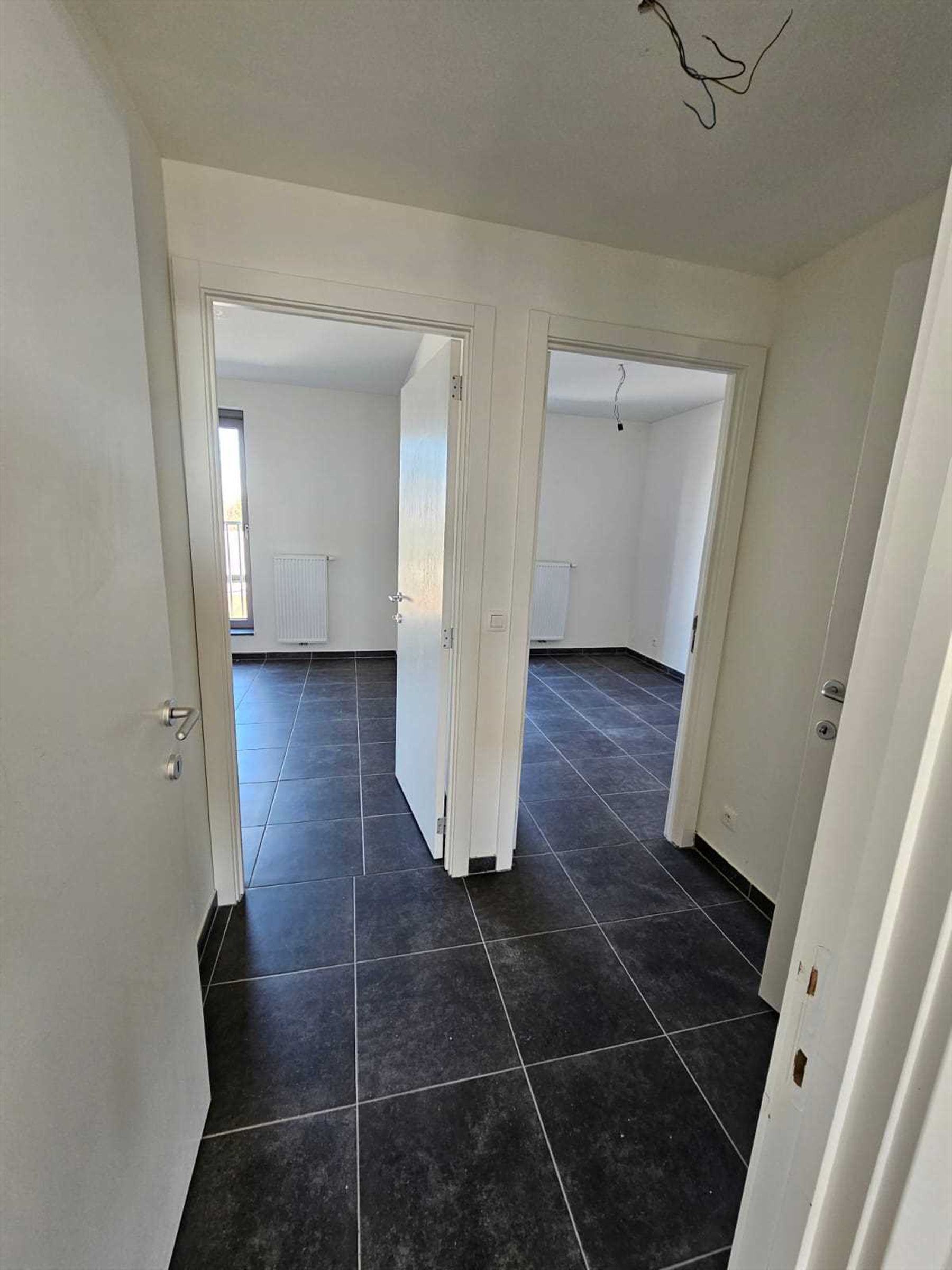 Ruim (104 m² bruto) en licht appartement met 2 slaapkamers! foto 2