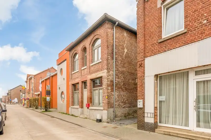 Handelsruimte met woonappartement in het centrum van Wommersom foto 3