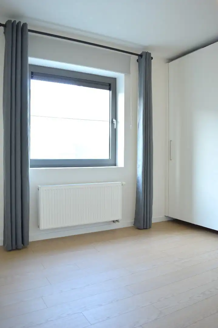 Ruim instapklaar appartement met 3 slaapkamers en autostaanplaats te koop nabij centrum Harelbeke foto 11