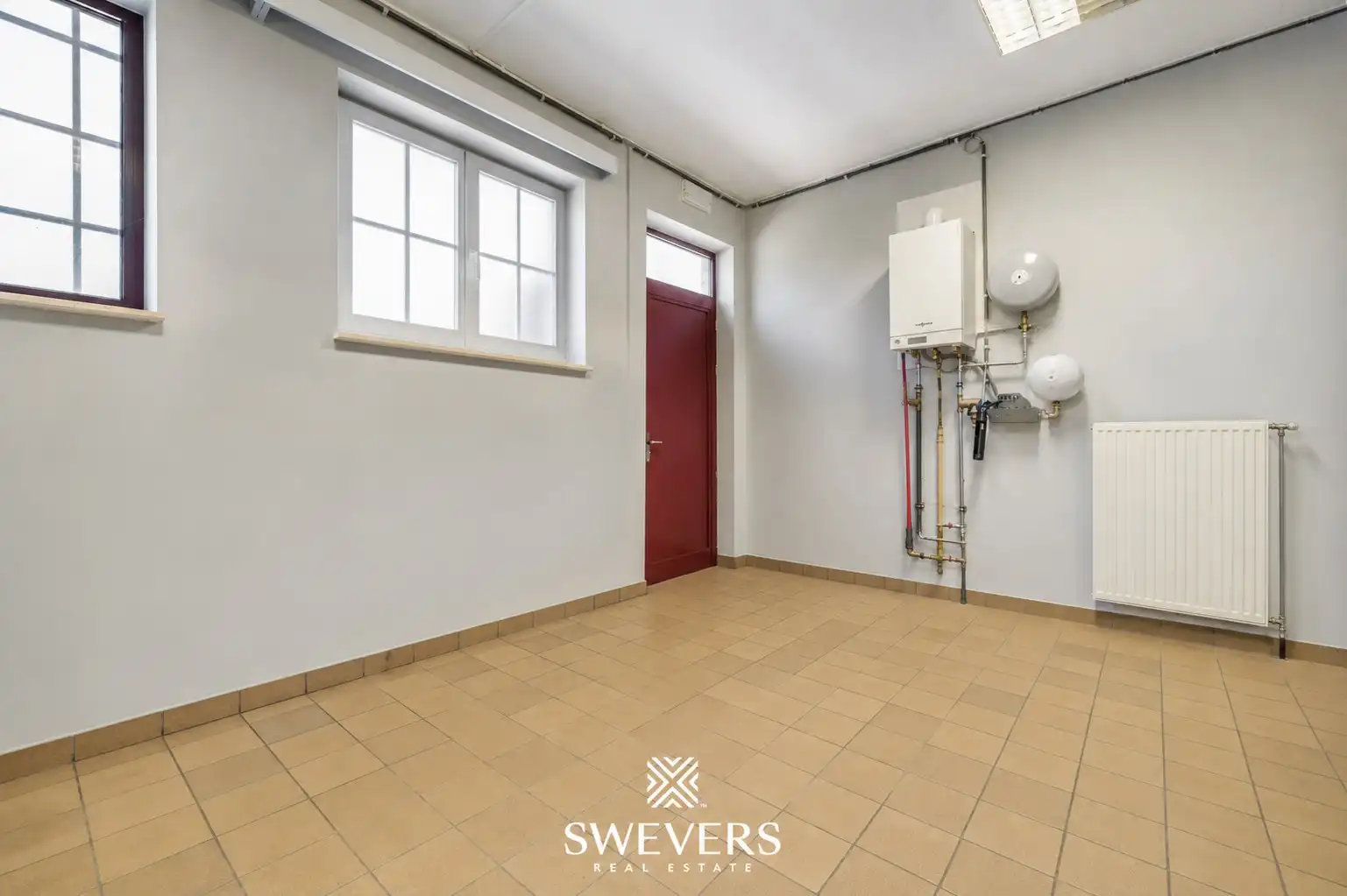Strategisch investeringspand in het hart van Beringen met onmiddellijk rendement foto 7
