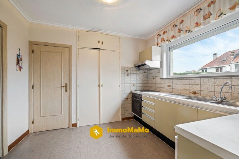 Te renoveren woonst in een rustige wijk te koop in Moerbeke foto 5