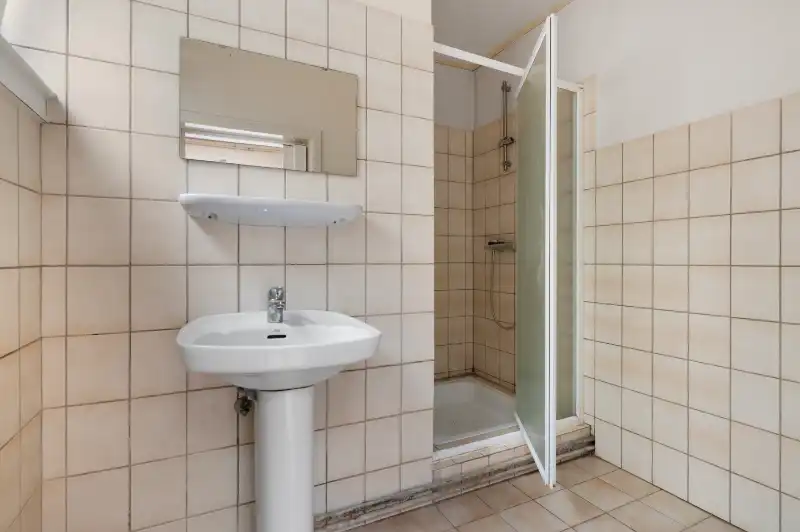 Te renoveren starterswoning met 2/3 slaapkamers en tuinjte foto 9
