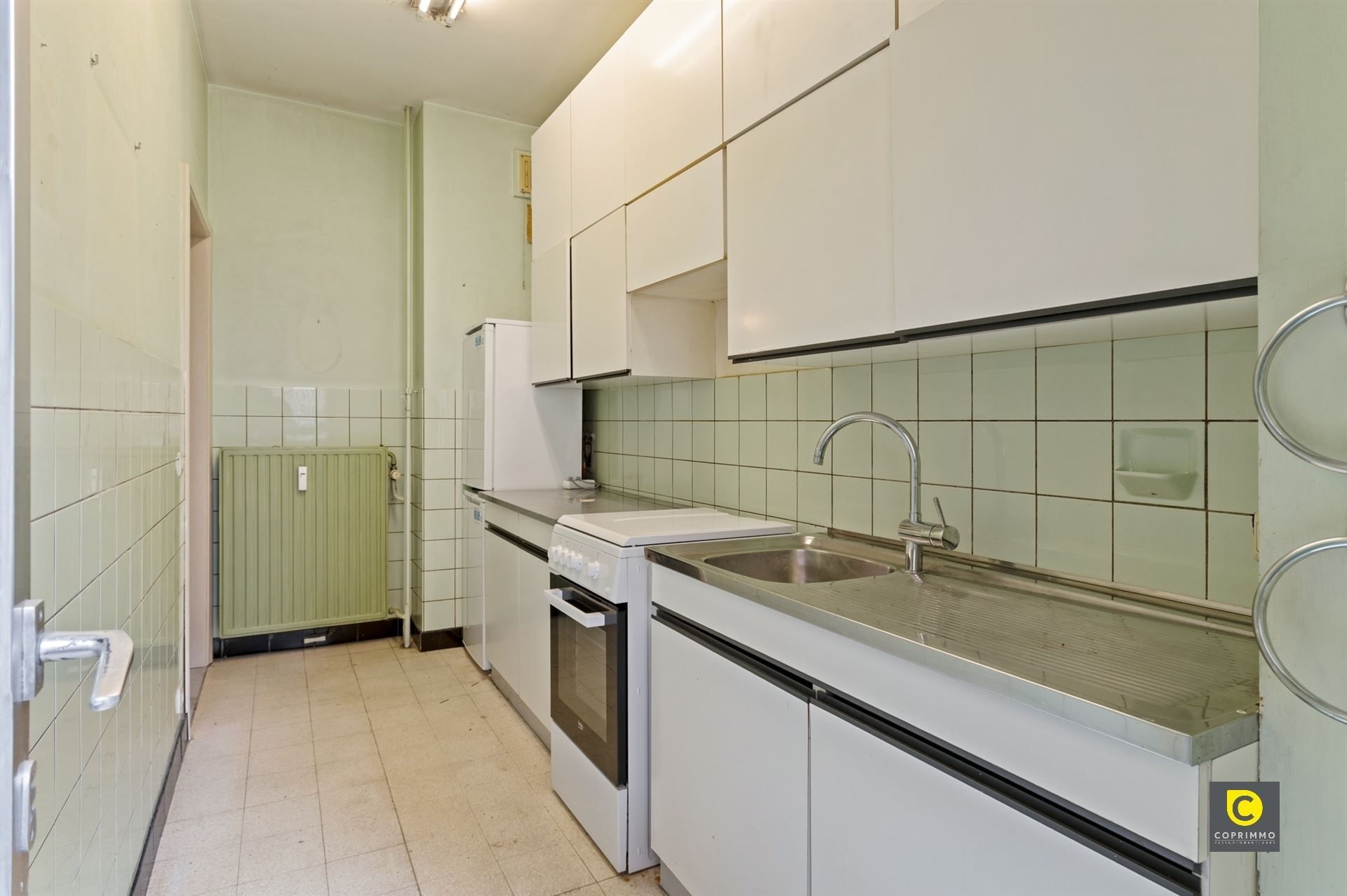 Te renoveren appartement op toplocatie! foto 8