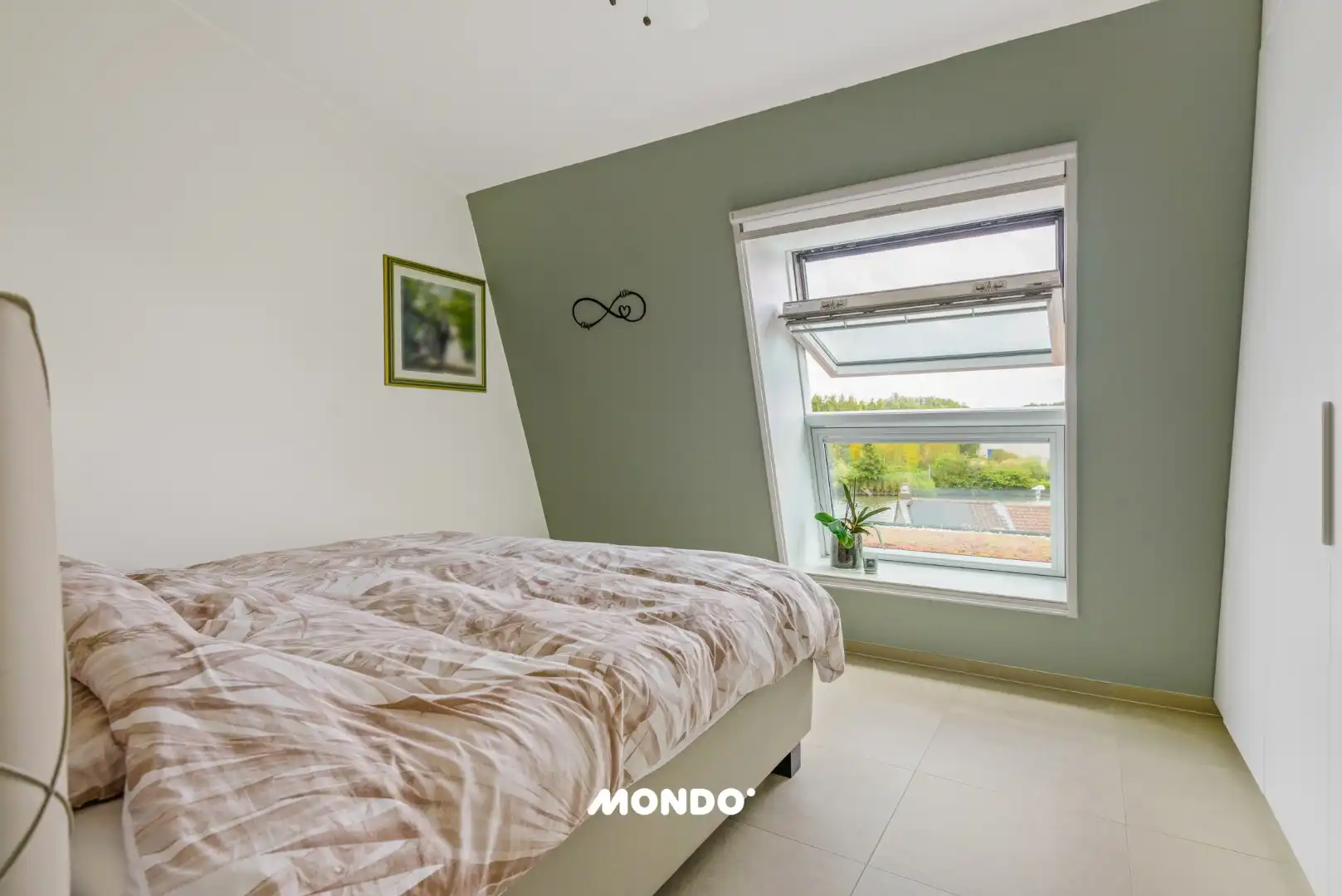 Energiezuinig penthouse met ruim terras, autostaanplaats en zicht op het kanaal foto 11