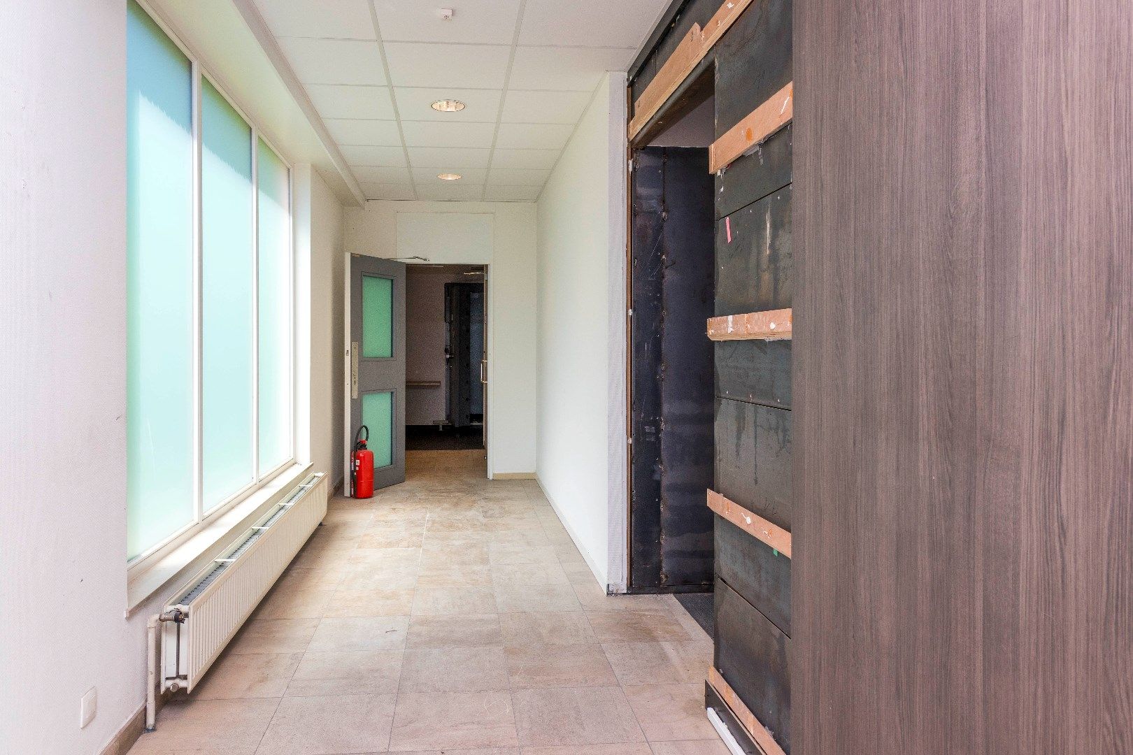 Ruim duplexappartement met gelijkvloerse handelsruimte foto 23