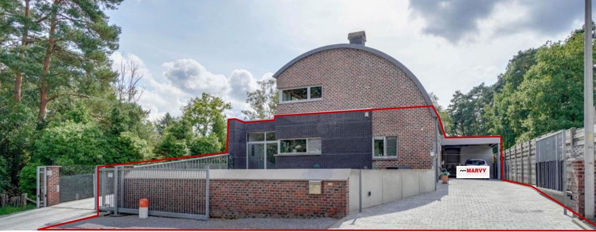 Gelijkvloers appartement met tuin foto {{pictureIndex}}