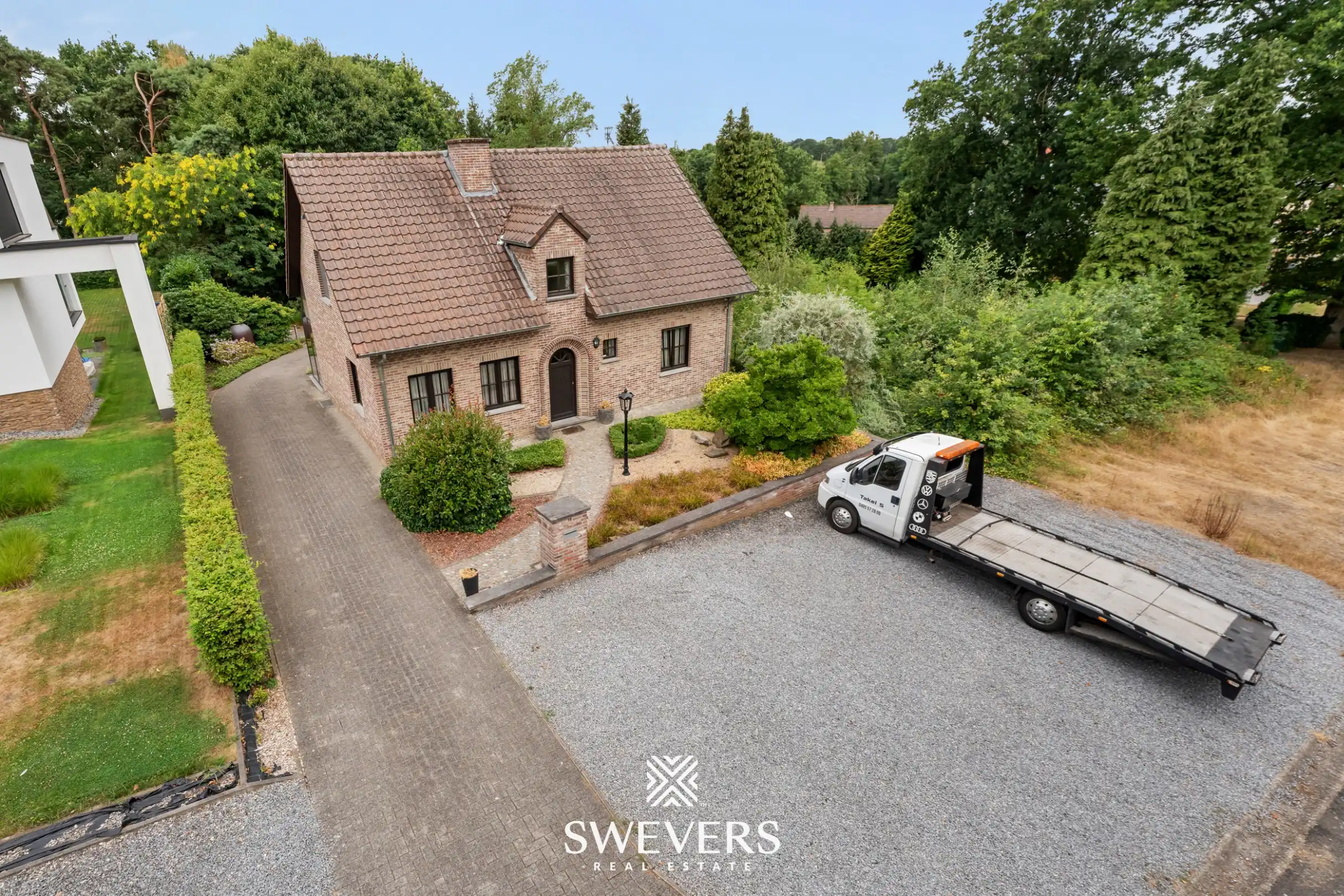 Open bebouwing in Houthalen met 3 slaapkamers, grote kelder en garage: foto 30