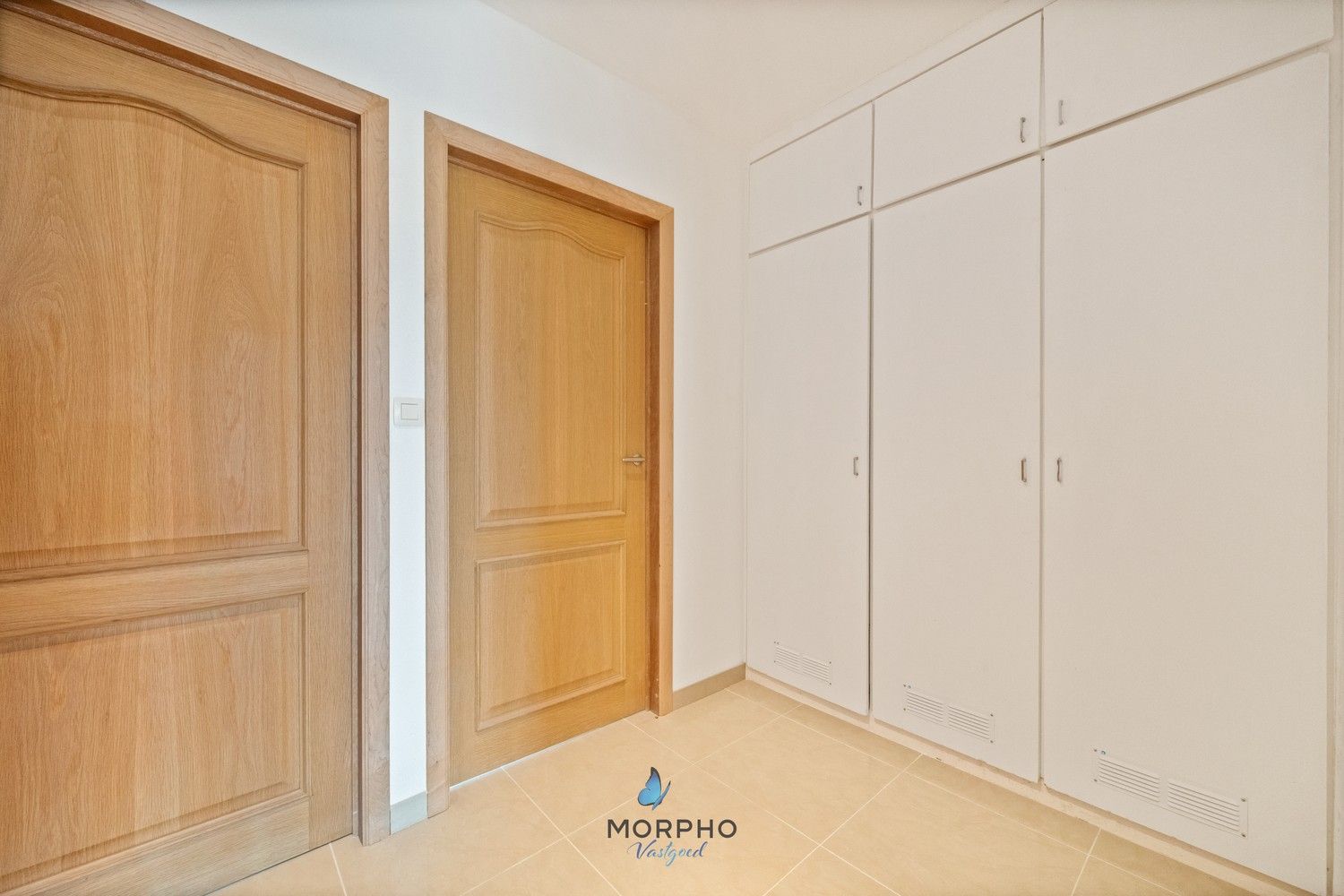 Modern en energiezuinig 2-slaapkamerappartement op de derde verdieping in hartje Temse! foto 12