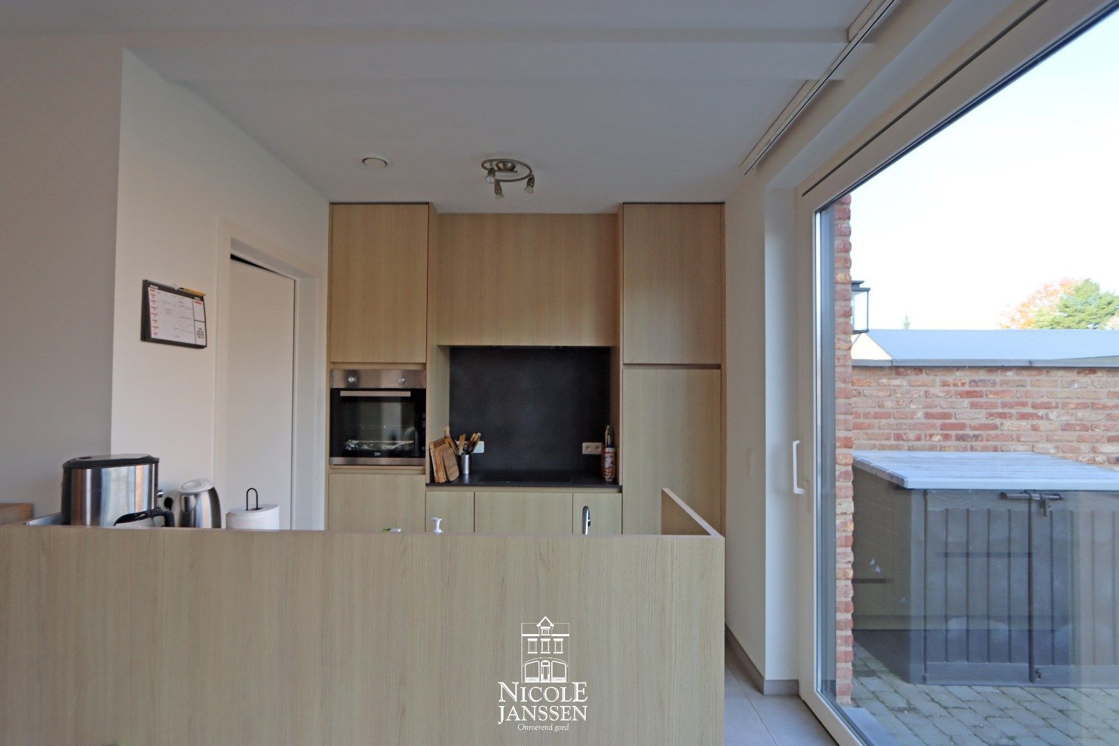 Nieuwbouwwoning met drie slaapkamers, tuintje en carport op een aangename en rustige locatie in Kessenich foto 7