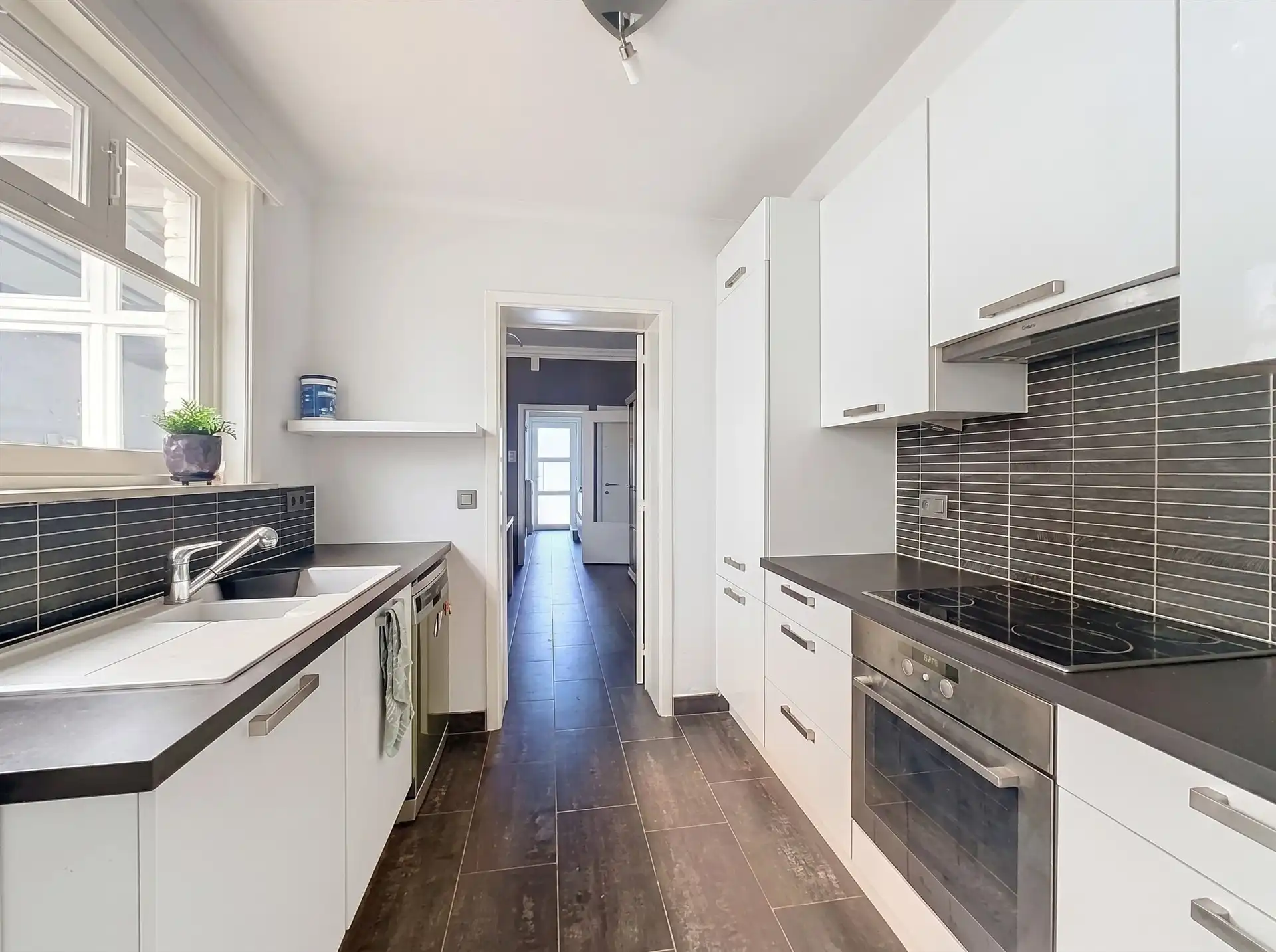 Instapklare woning met halfopen karakter en 4 slaapkamers nabij centrum Sint-Niklaas! foto 8