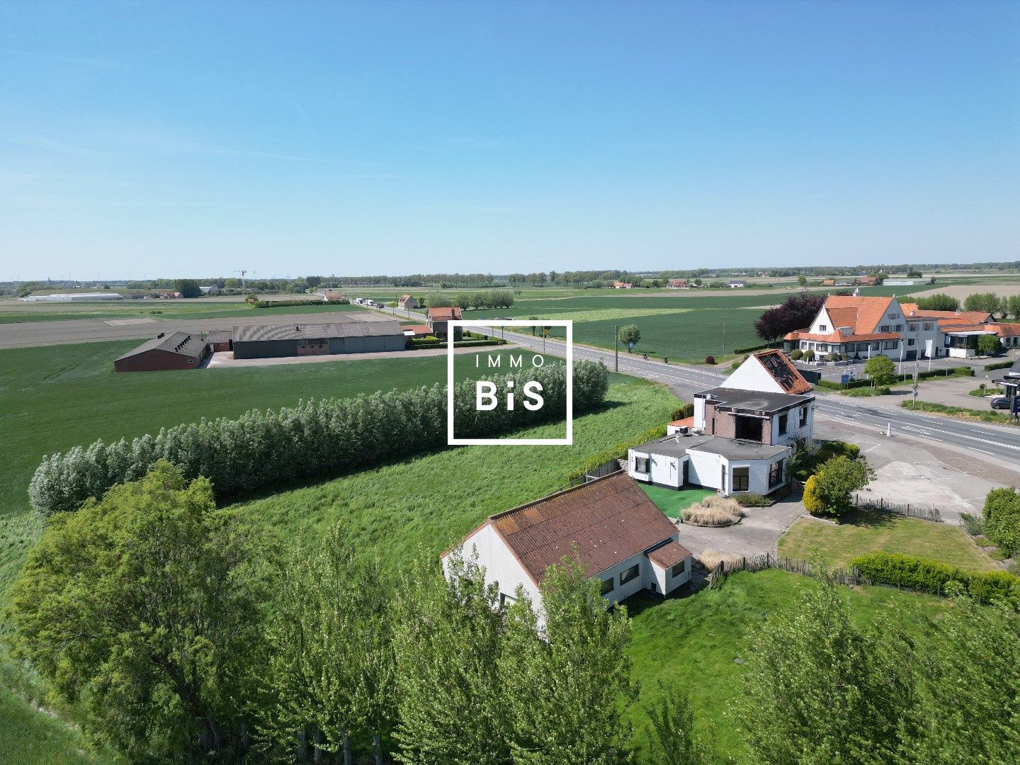 Hoofdfoto van de publicatie: Zeer commercieel gelegen bouwperceel van 2.478 m² aan de grens met Sluis.