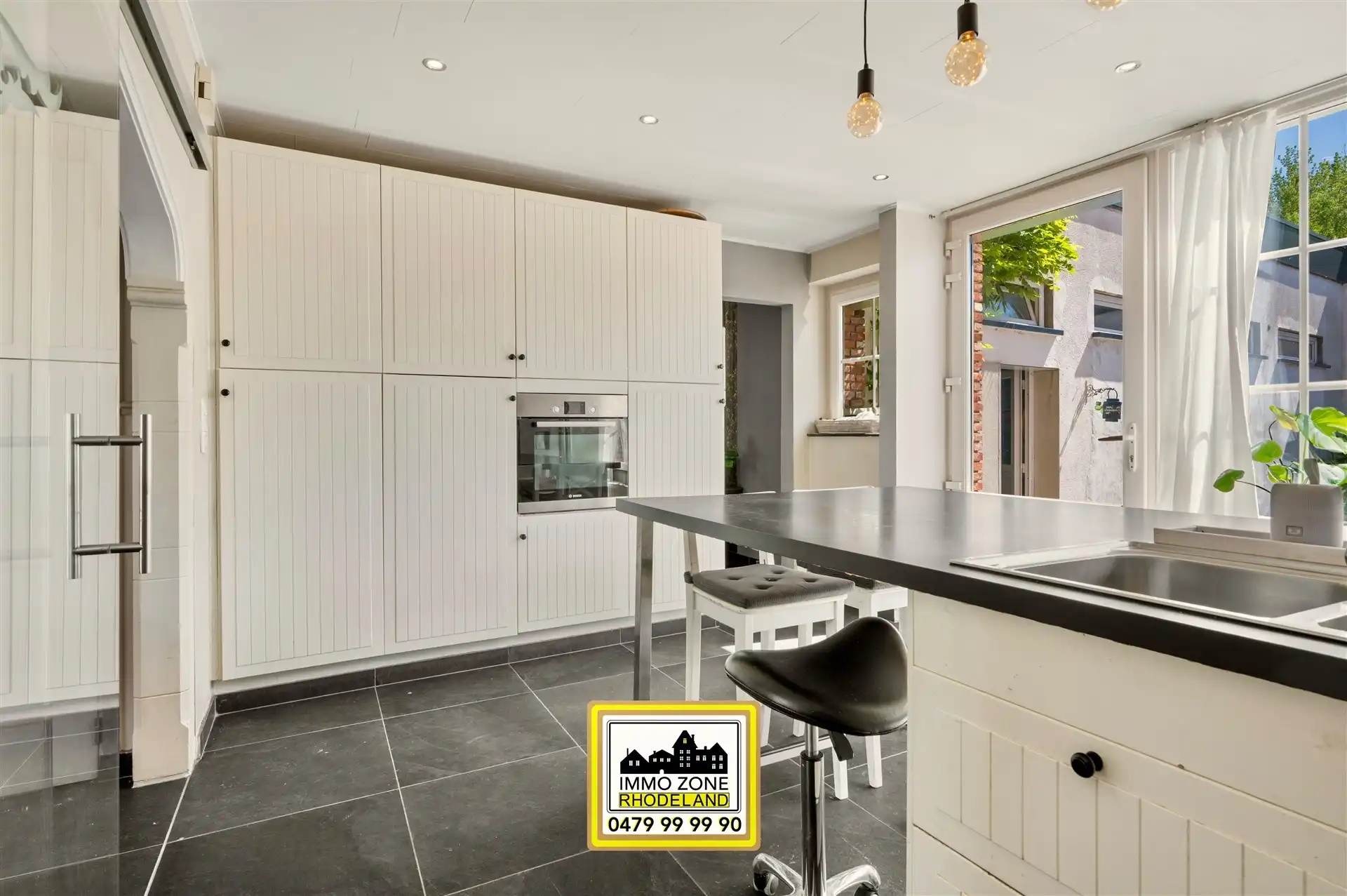 Ruime woning met multifunctioneel bijgebouw en grote tuin foto 11
