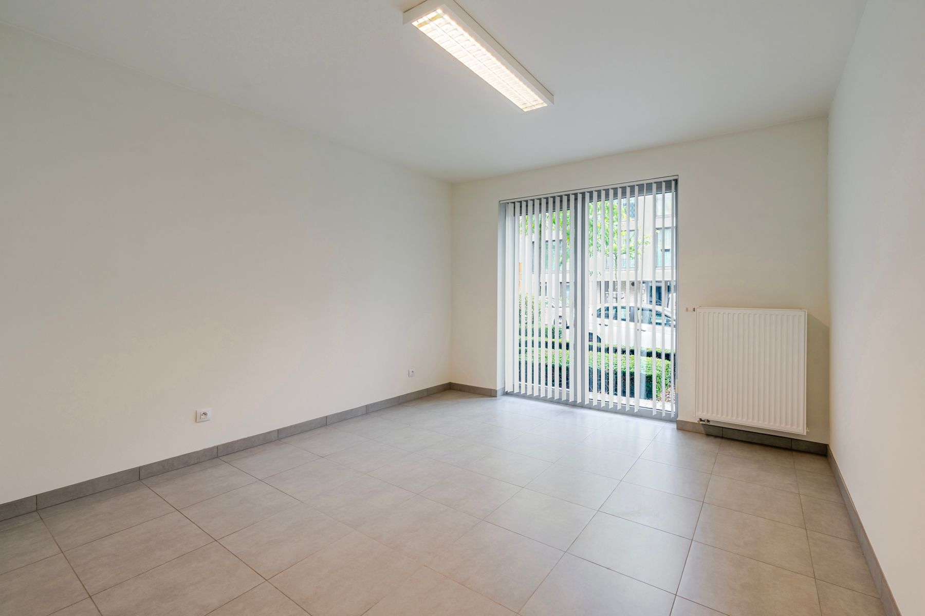 Instapklaar 2 slaapkamer appartement met grote tuin foto 9