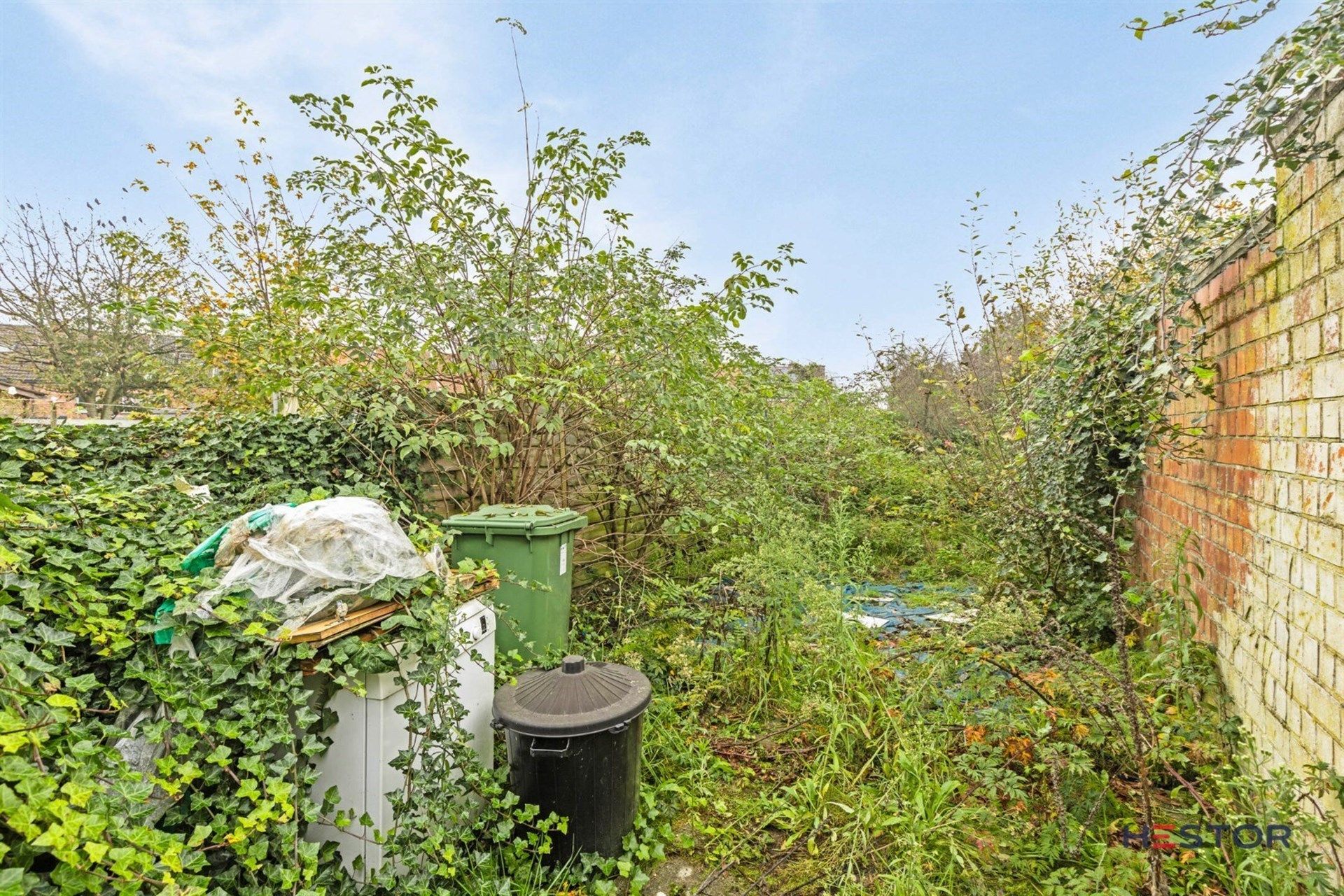 Op te frissen woning, met tuin in Temse foto 11