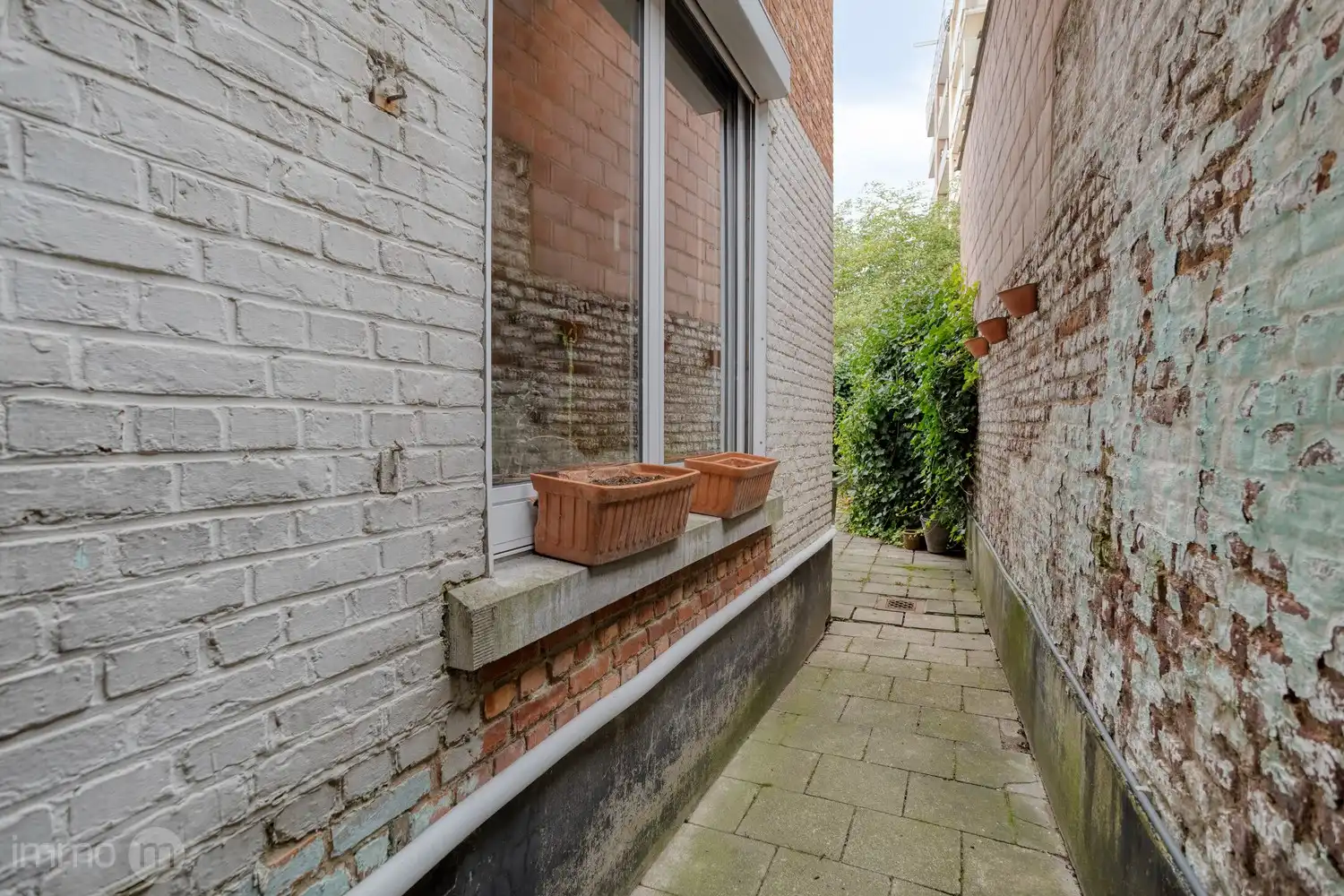 OPBRENGSTEIGENDOM MET 3 RUIME APPARTEMENTEN OP TOPLOCATIE AAN DE TIENSEPOORT foto 8