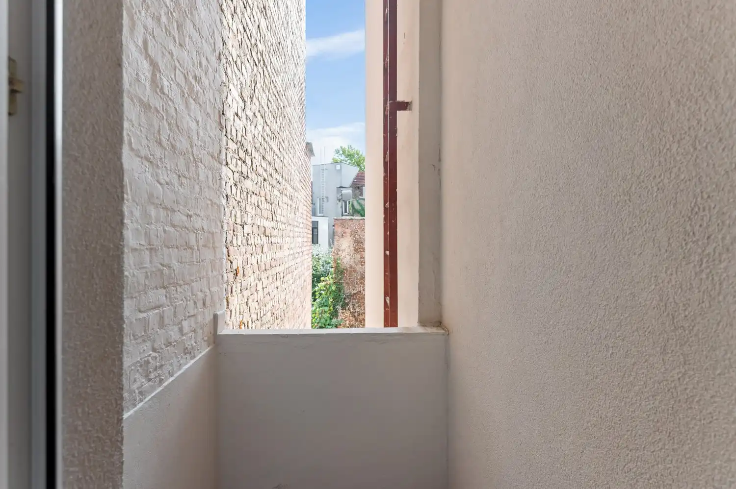 Licht en ruimte in het hart van Antwerpen – 1 slaapkamer appartement foto 10