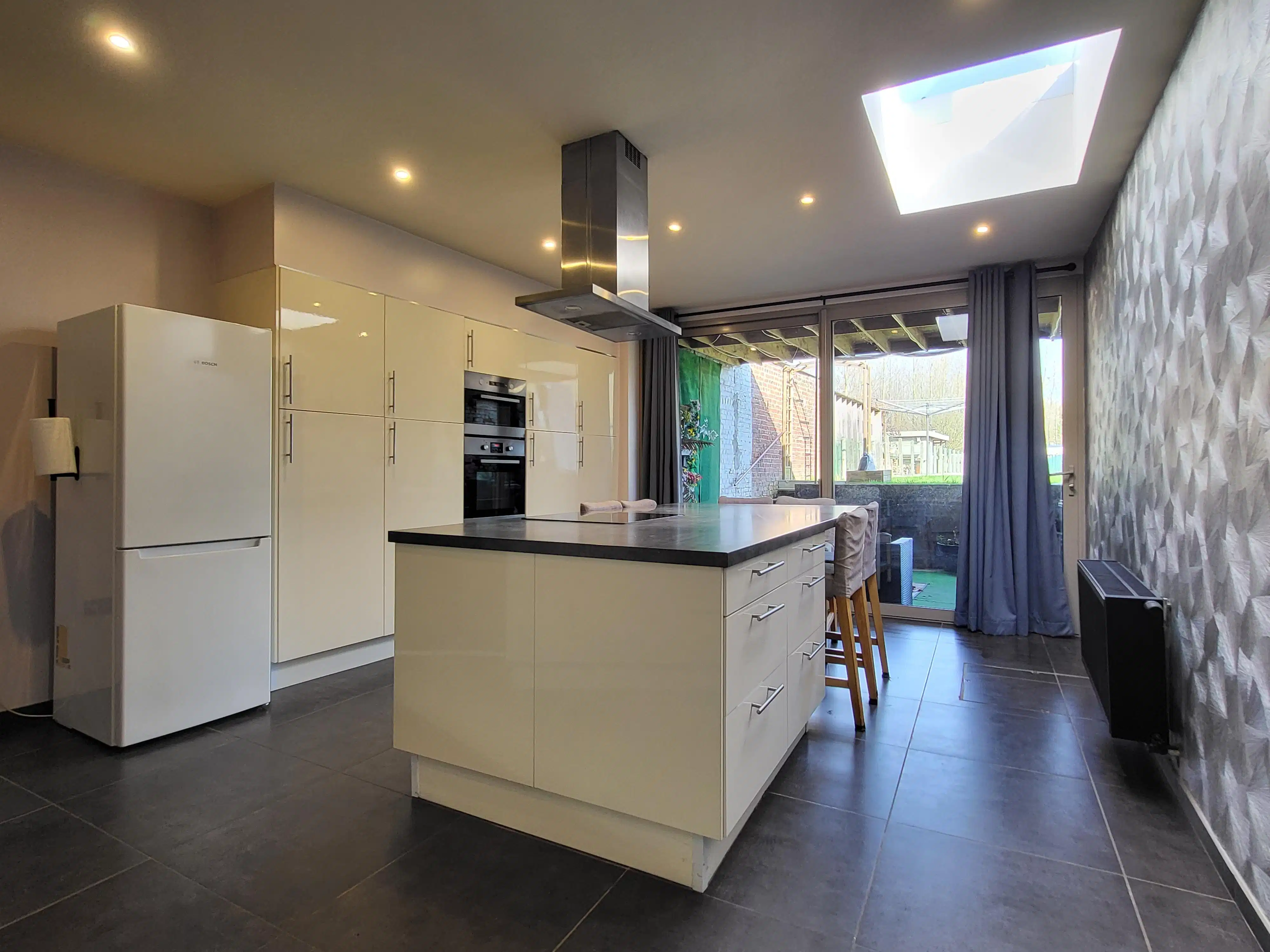 Ruime en karaktervolle gezinswoning op een perceel van 480 m² met zuidoostgerichte tuin, gelegen aan de centrumrand van Brakel.  foto 9