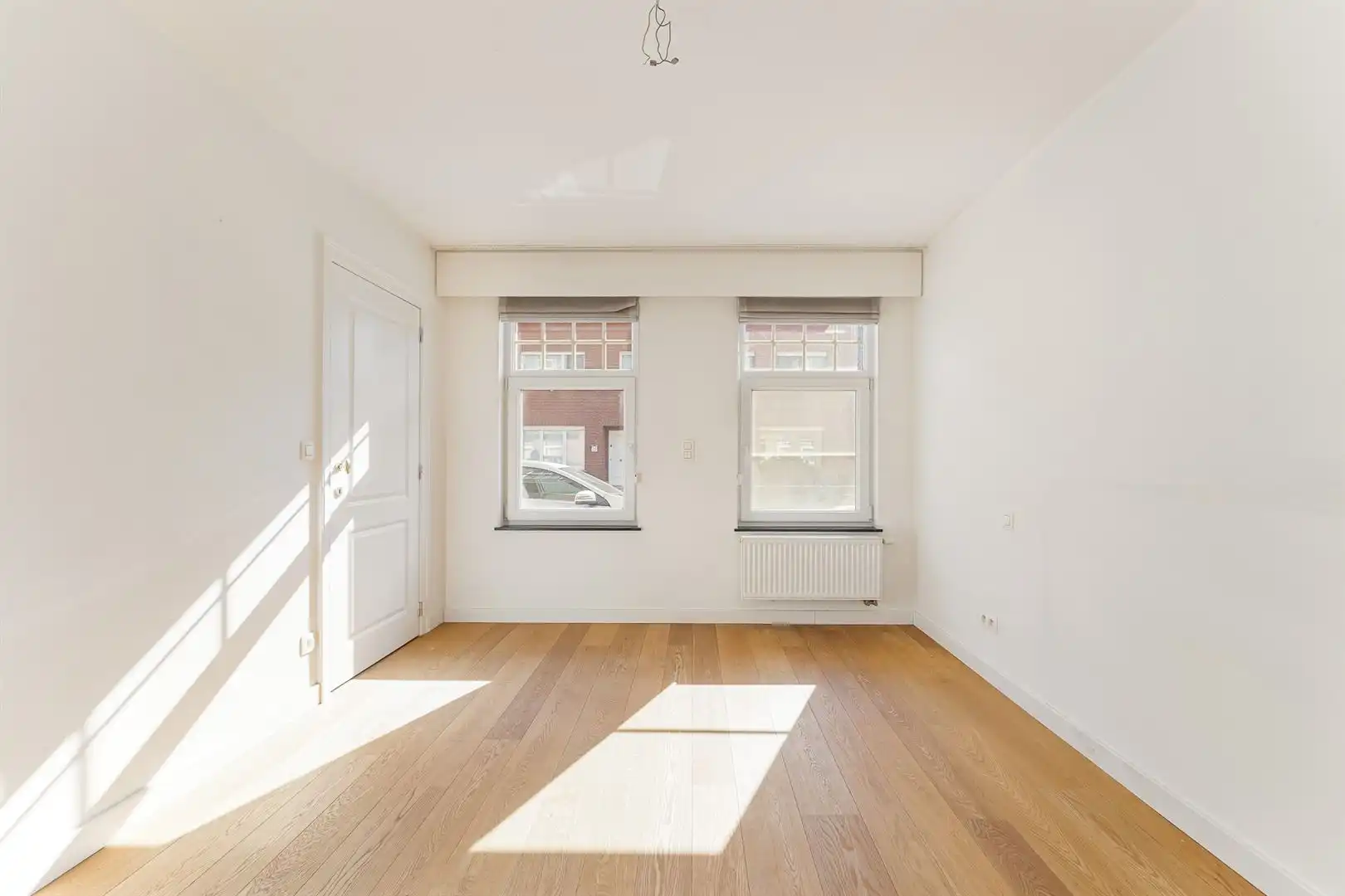 Gelijkvloers appartement met 2 slaapkamers en garage! foto 13