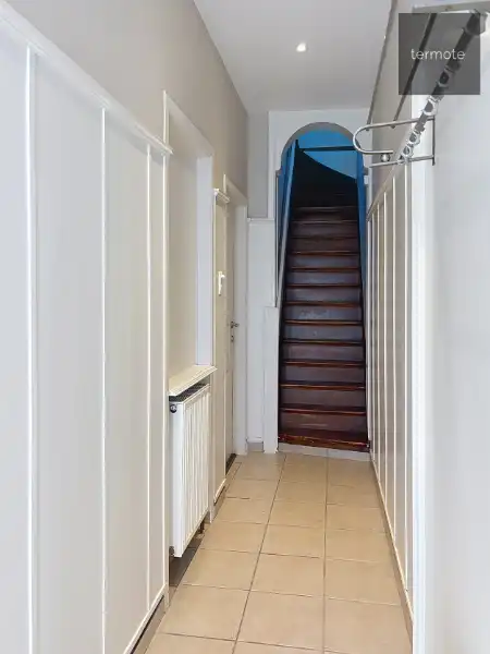 Knusse rijwoning foto 2