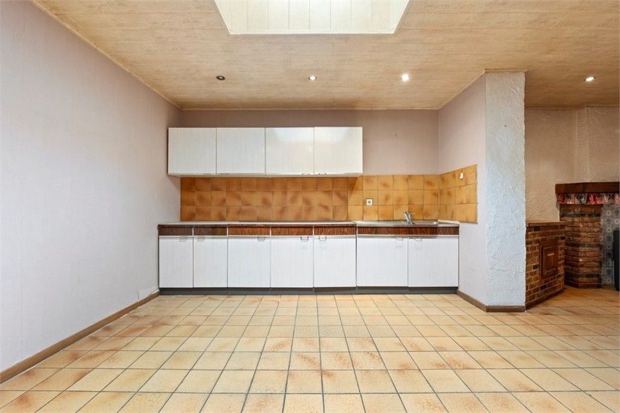 TE RENOVEREN RIJWONING VLAKBIJ HET CENTRUM VAN SINT-TRUIDEN foto 11