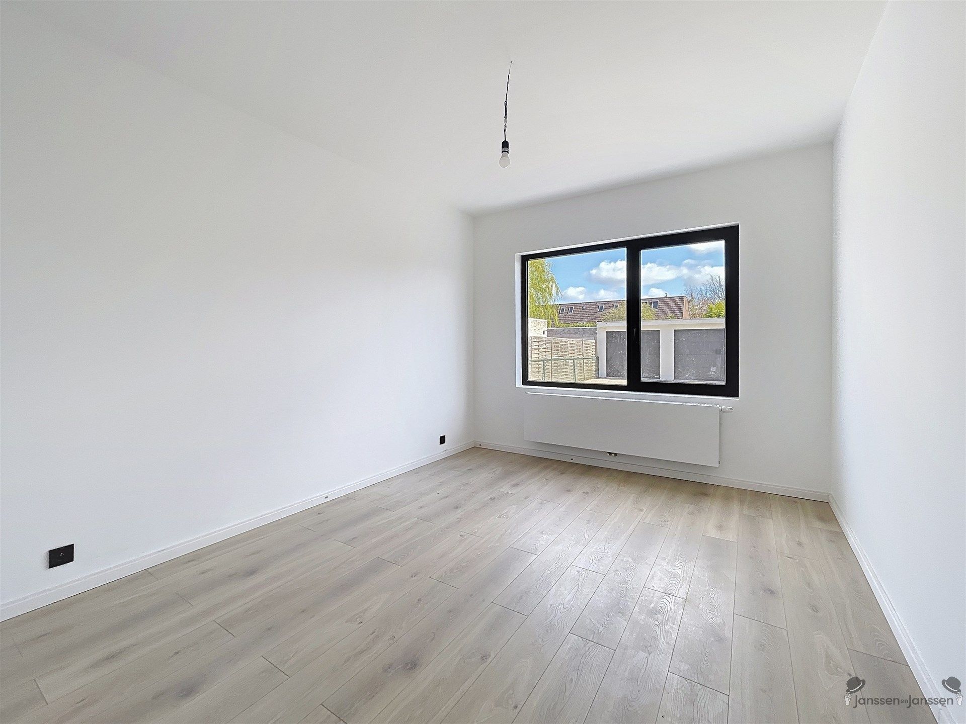 Gelijkvloers appartement met 2 slaapkamers, terras en tuin foto 8