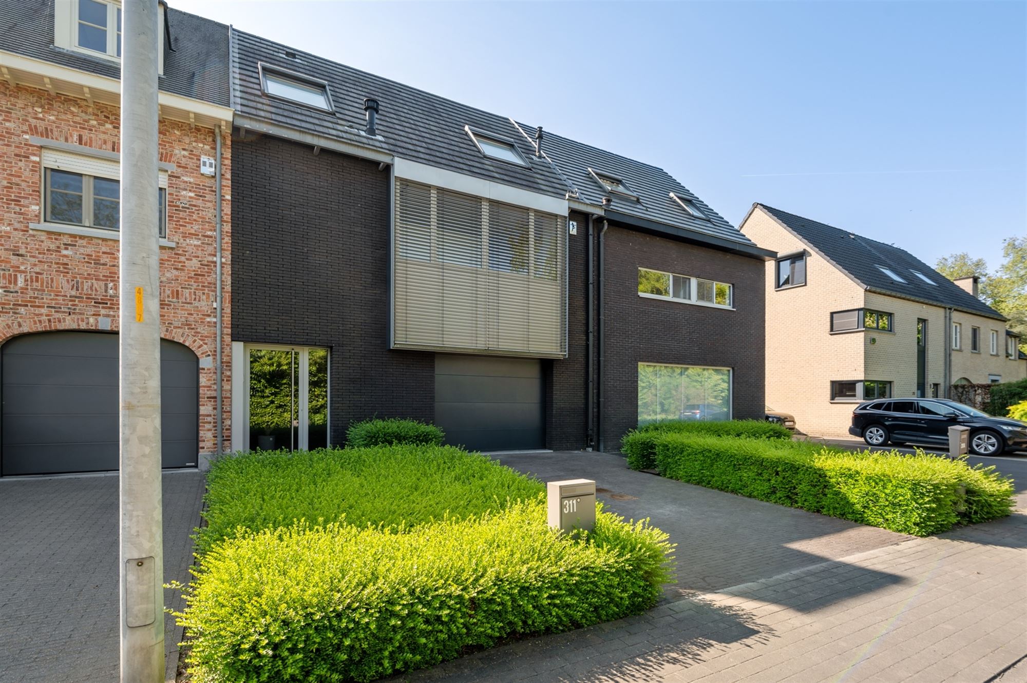 Moderne conceptwoning te Sint-Katelijne-Waver. foto {{pictureIndex}}