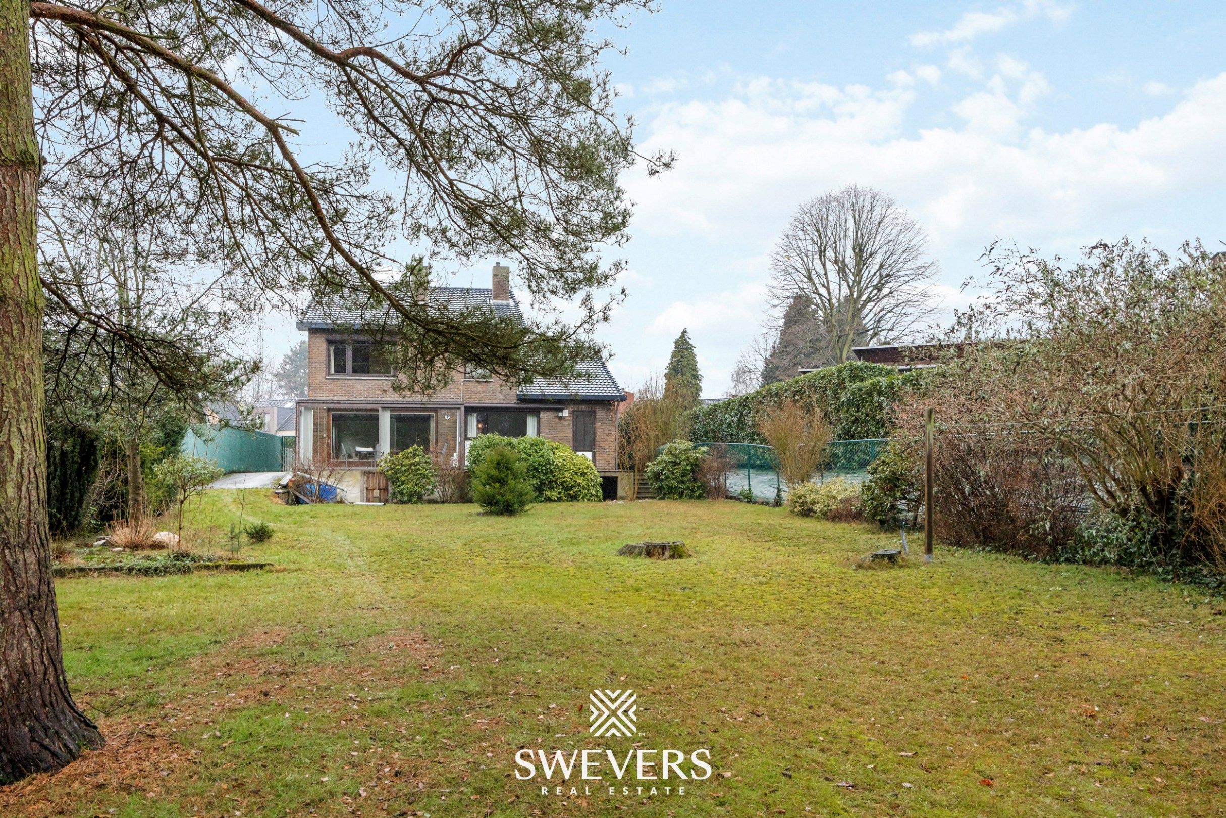 Vrijstaande woning met 329 m² wooncomfort, praktijkruimte en grote tuin foto 24