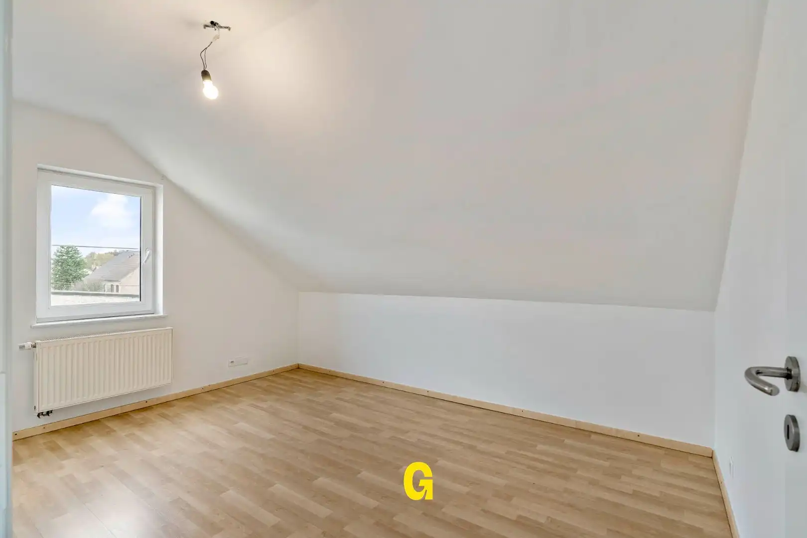 *** VERKOCHT *** Aangenaam duplexappartement met drie slaapkamers, autostandplaats en kelderberging foto 15
