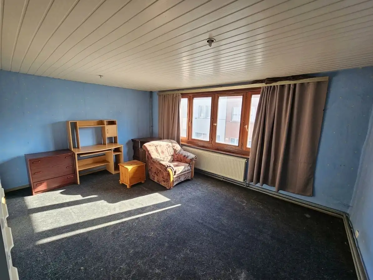 Te renoveren rijwoning op topligging! foto 7
