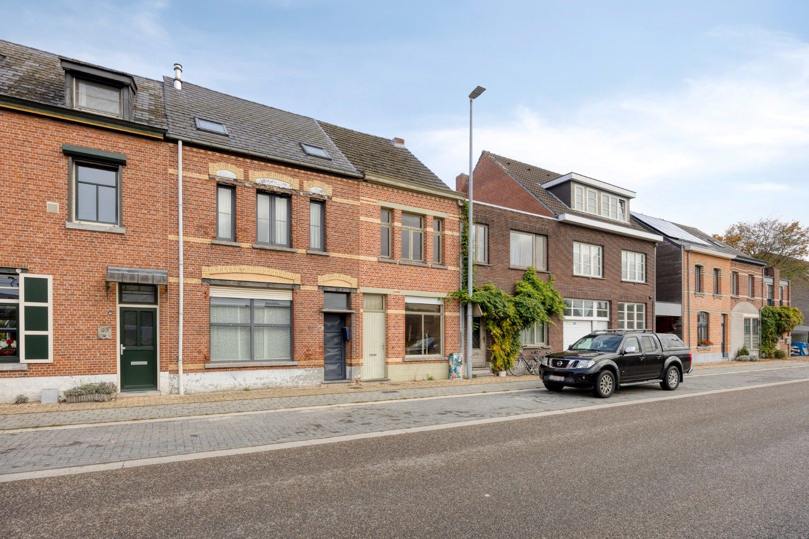 Te renoveren woning langs het centrum van Mol !  foto 20